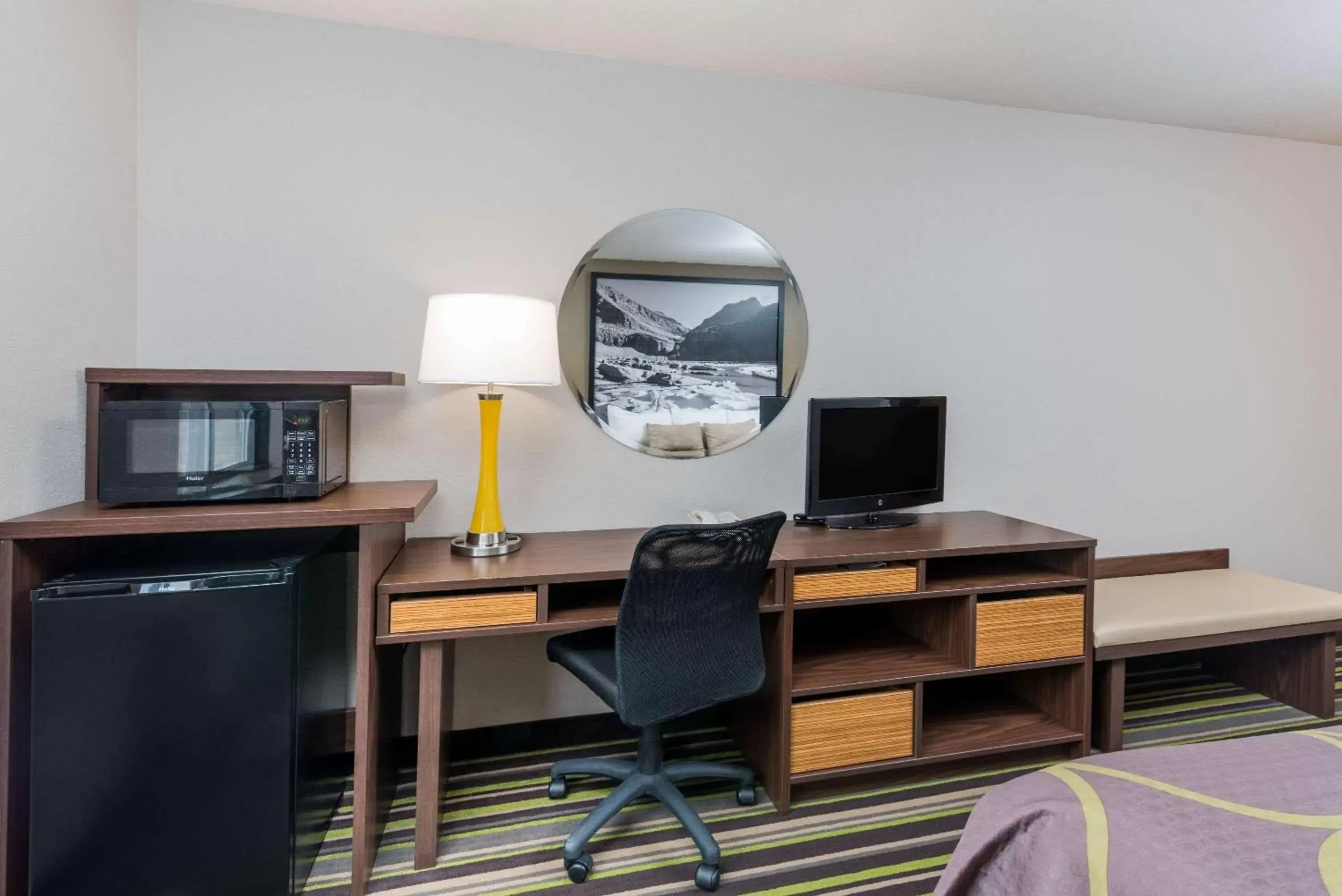 Photo of the whole room, TV/Entertainment Center in Super 8 by Wyndham Kalispell Glacier National Park
