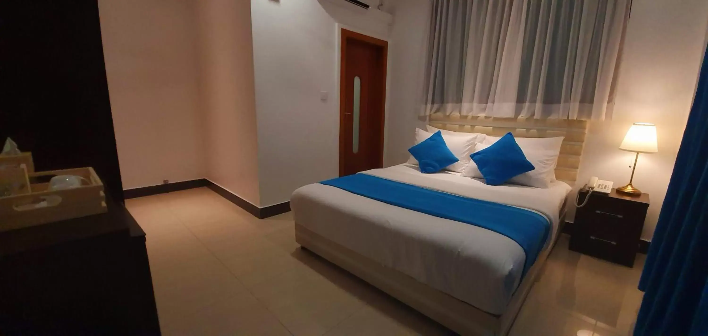 Photo of the whole room, Bed in Huvan Beach Hotel at Hulhumale