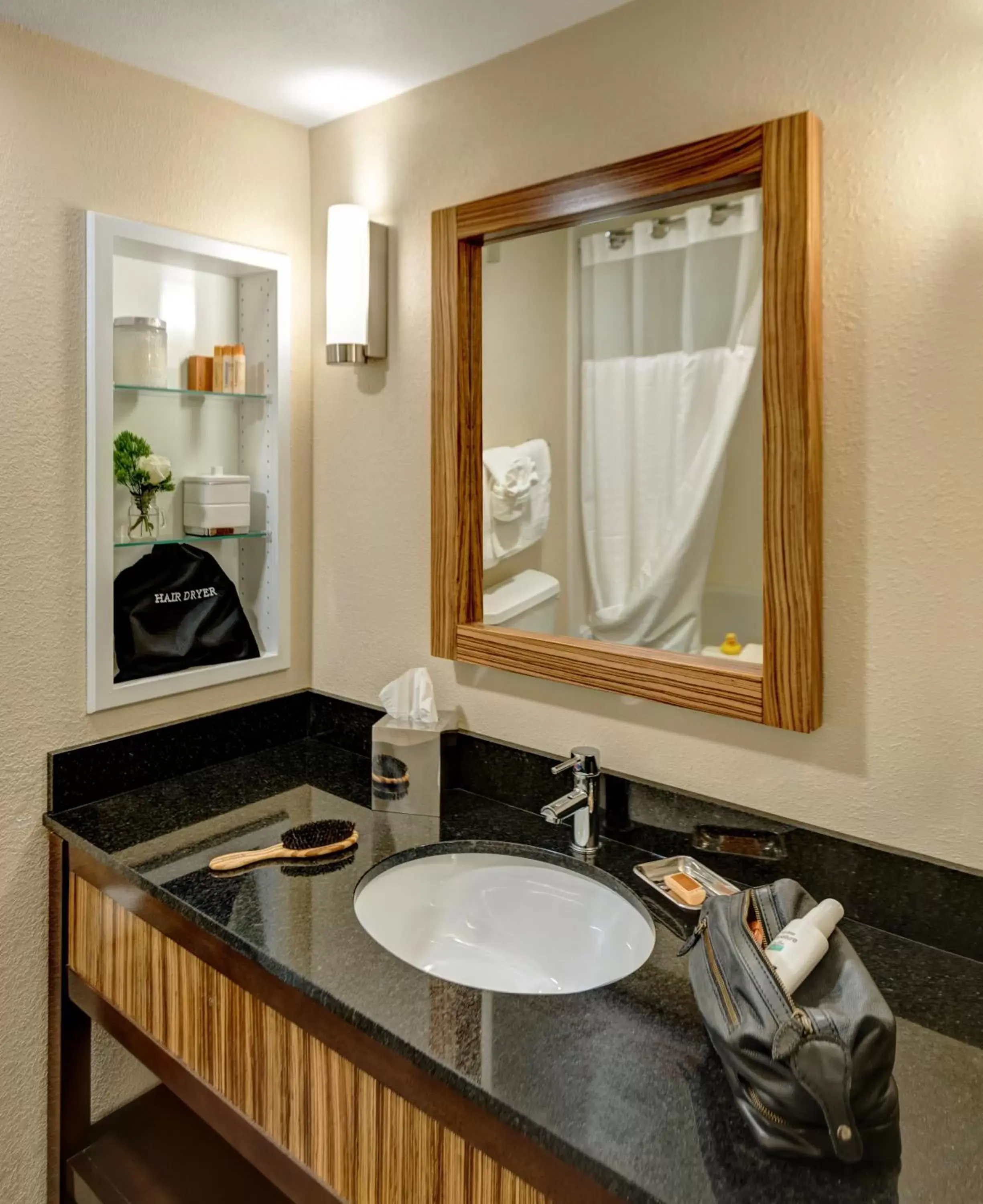 Bathroom in The Garrison Hotel & Suites Dover-Durham, Ascend Hotel Collection