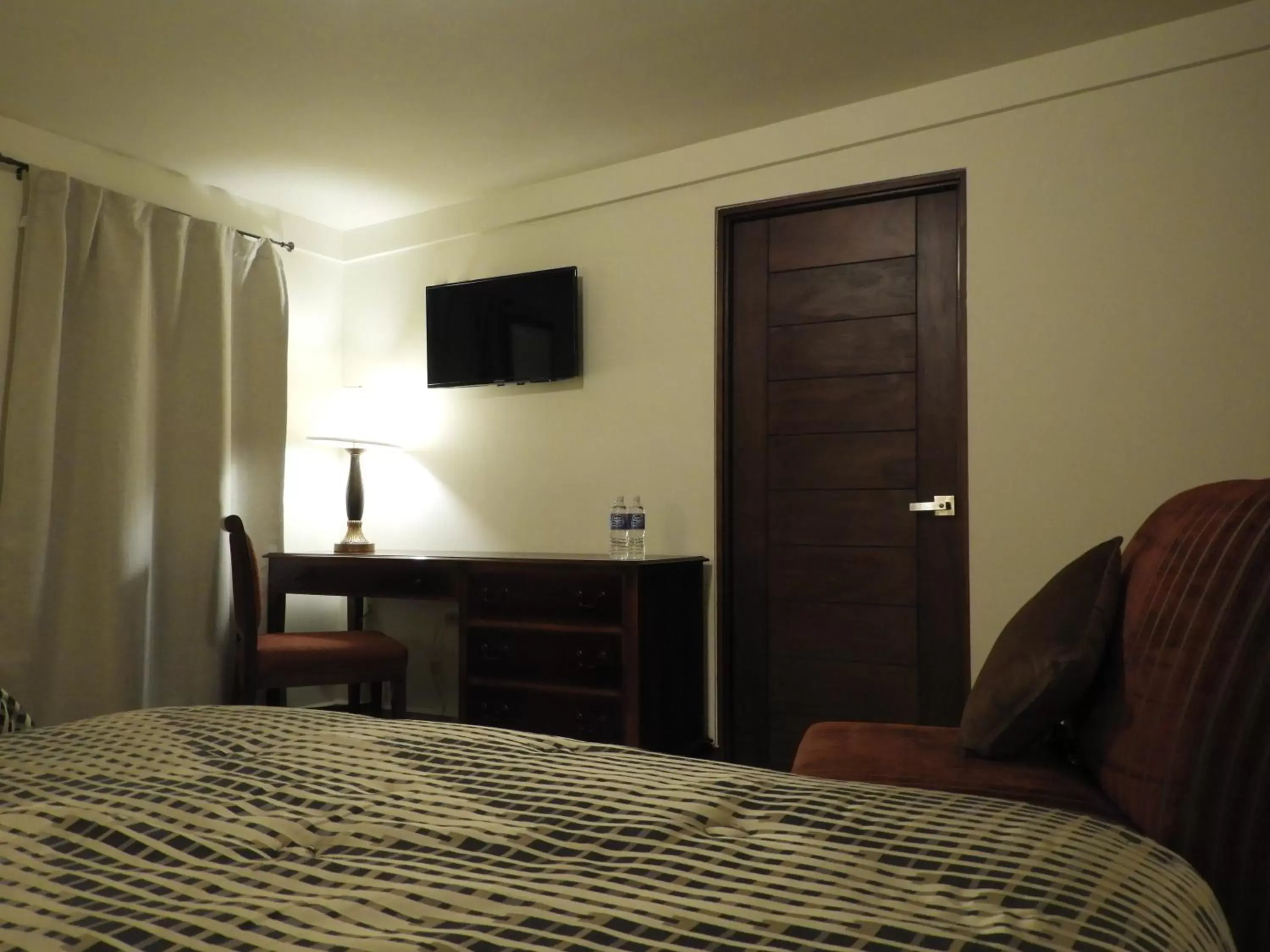 TV and multimedia, Bed in Casona San Cayetano Suites & Lofts by Lunian