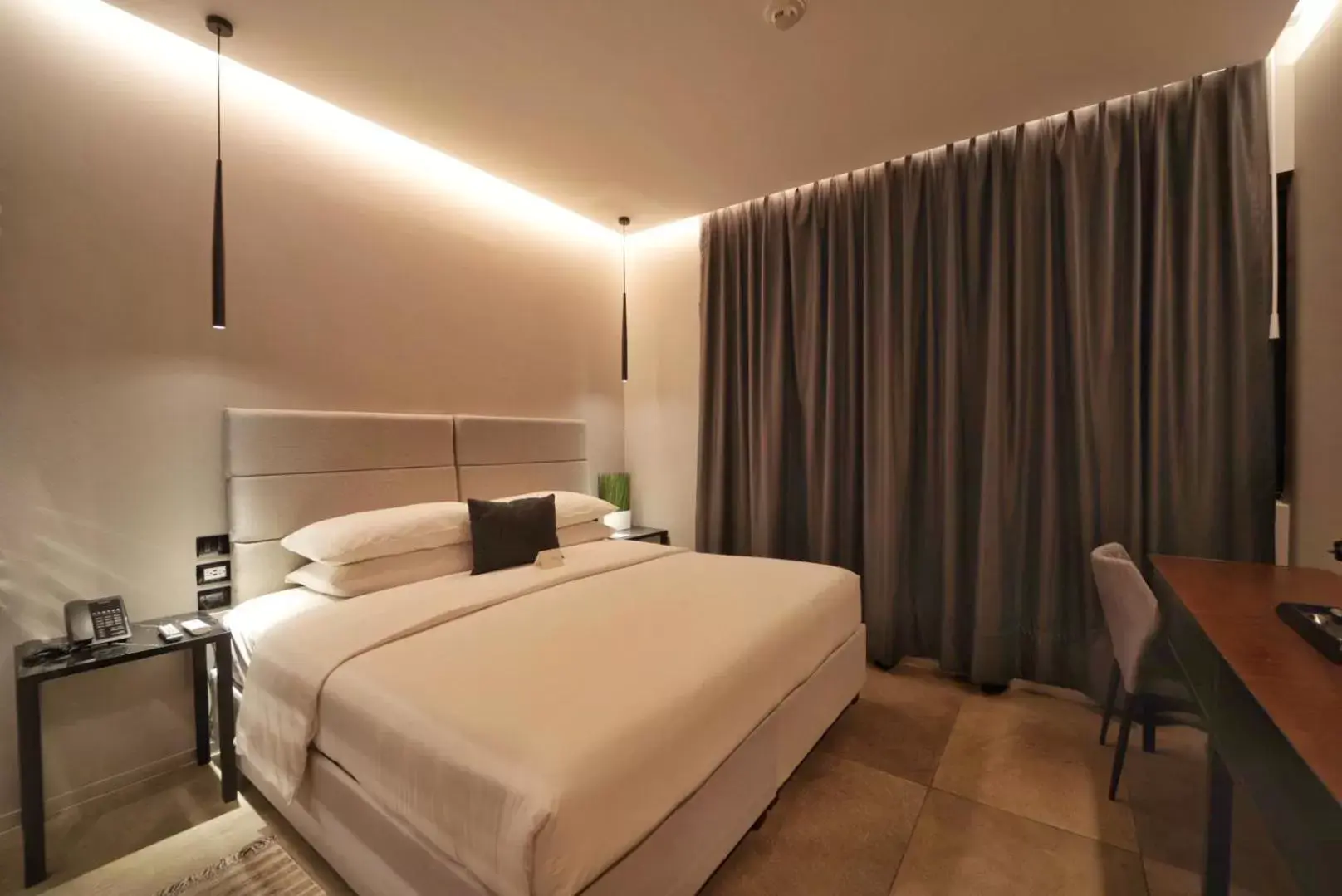 Bed in Ontico Urban Design Hotel