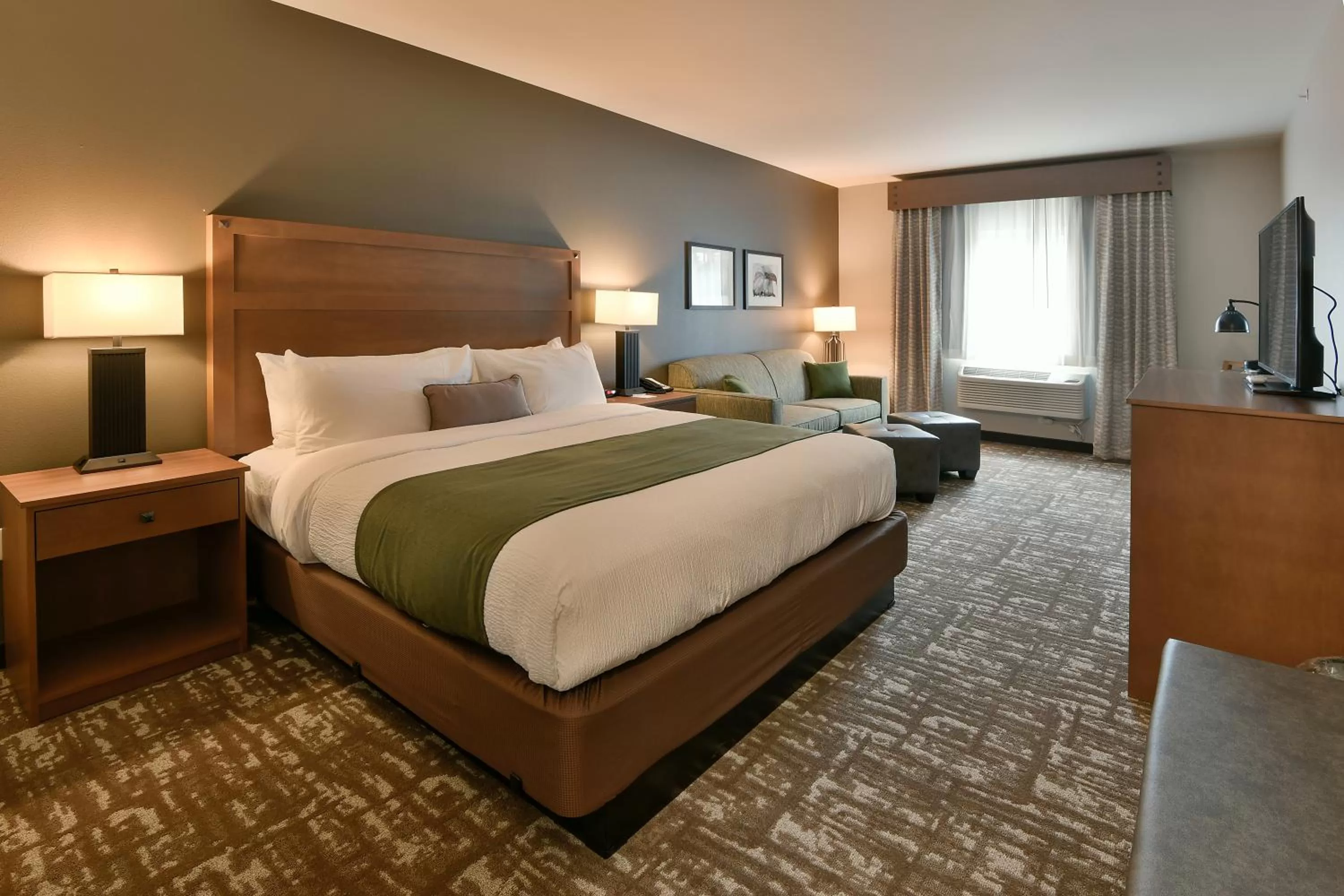 Photo of the whole room, Bed in GrandStay Hotel & Suites