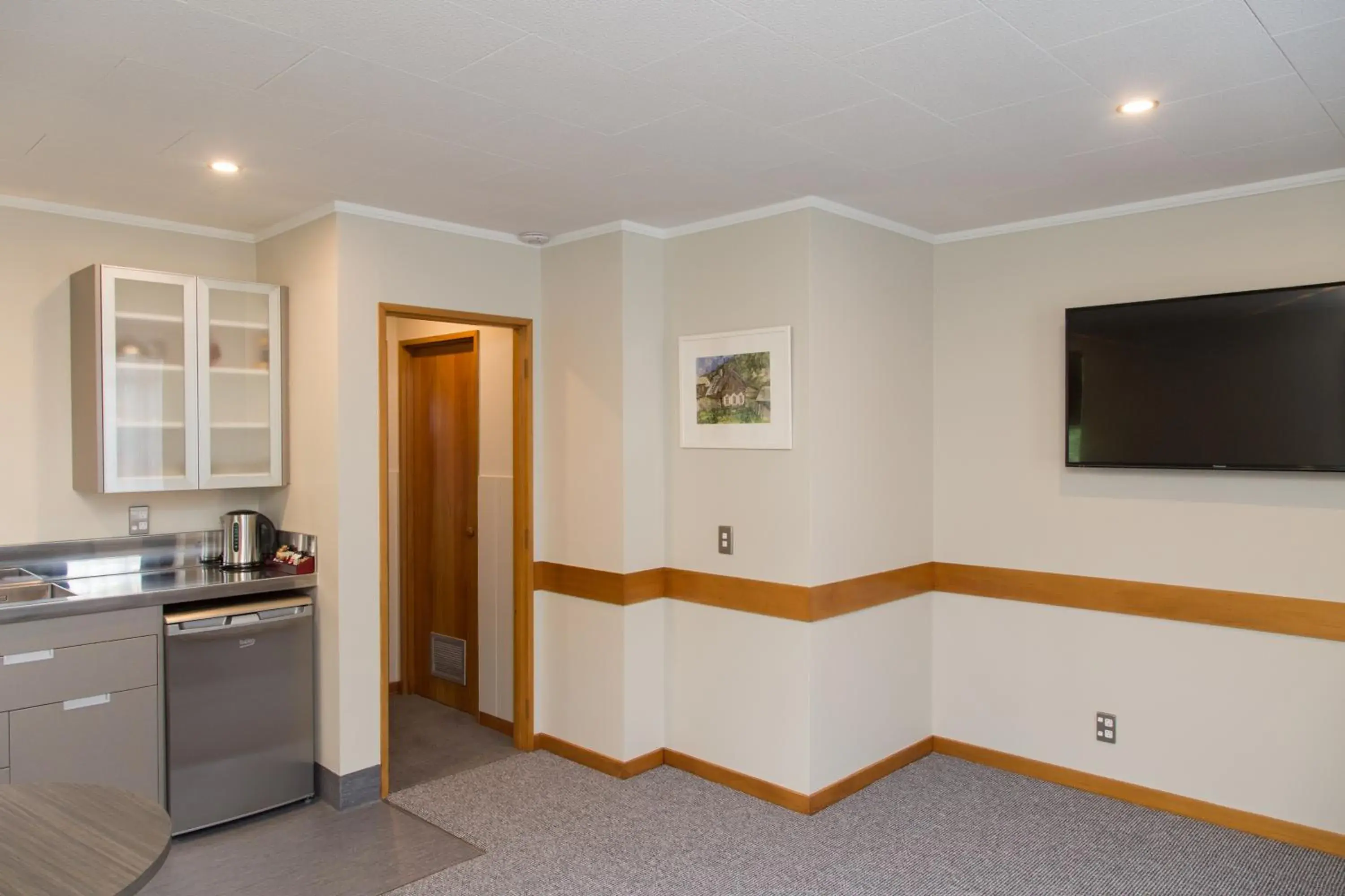 Kitchen/Kitchenette in Dunedin Motel and Villas