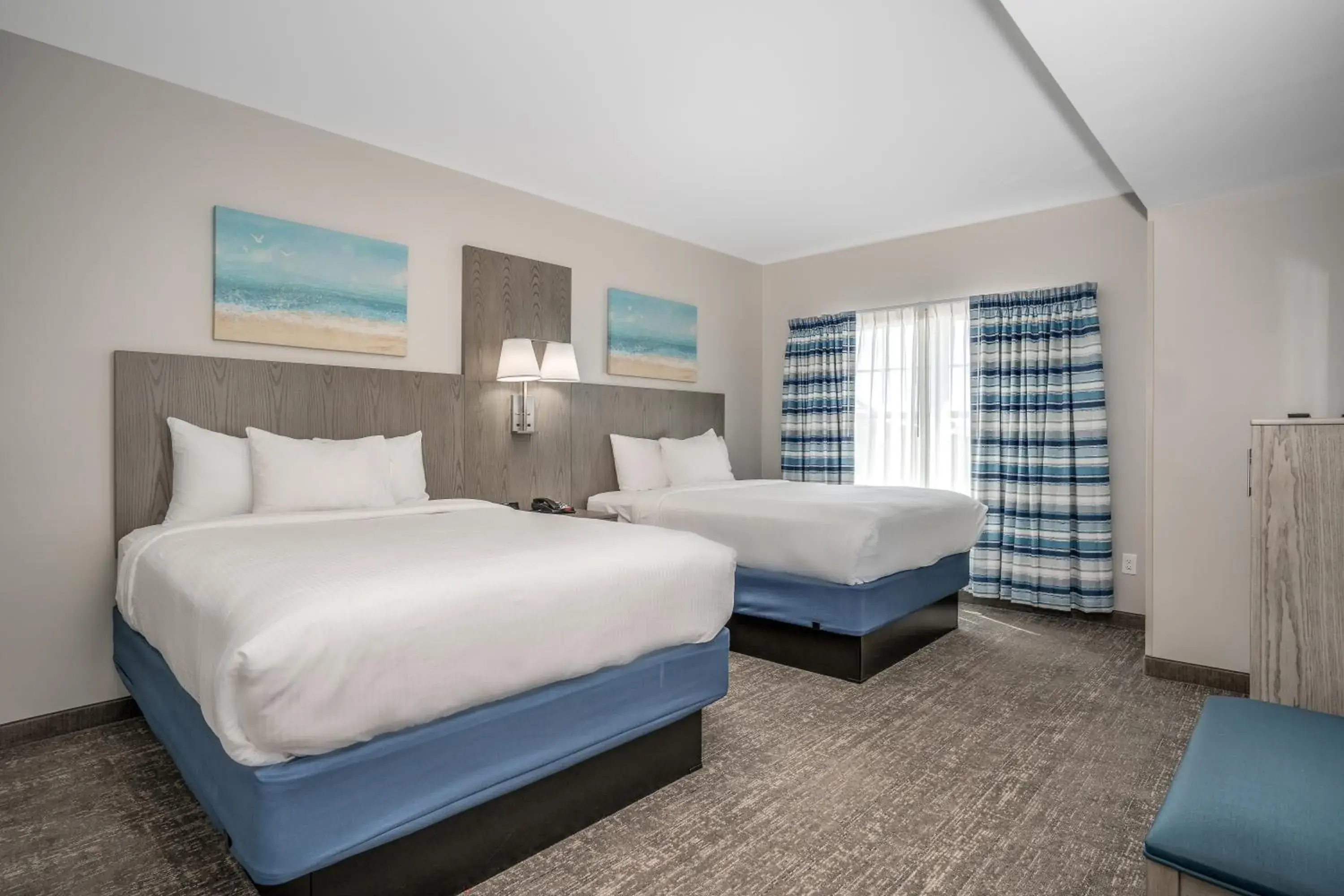 Bedroom, Bed in Lighthouse Suites - Best Western Signature Collection