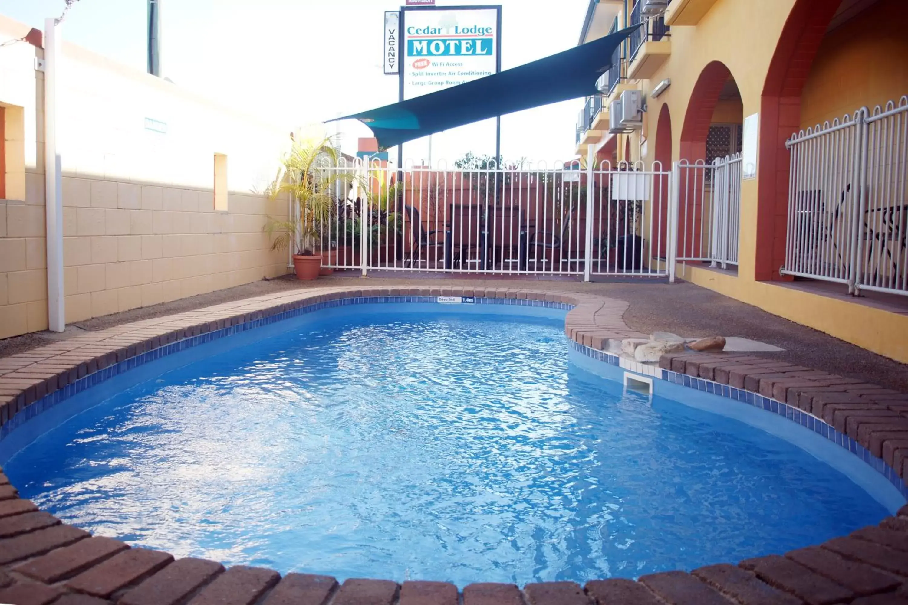 Day, Swimming Pool in Cedar Lodge Motel