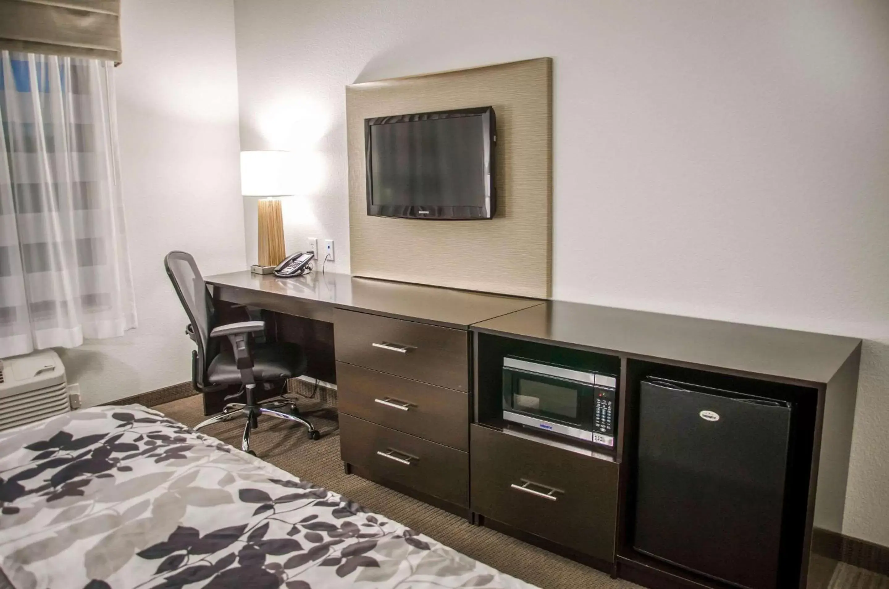 Photo of the whole room, TV/Entertainment Center in Sleep Inn & Suites Center