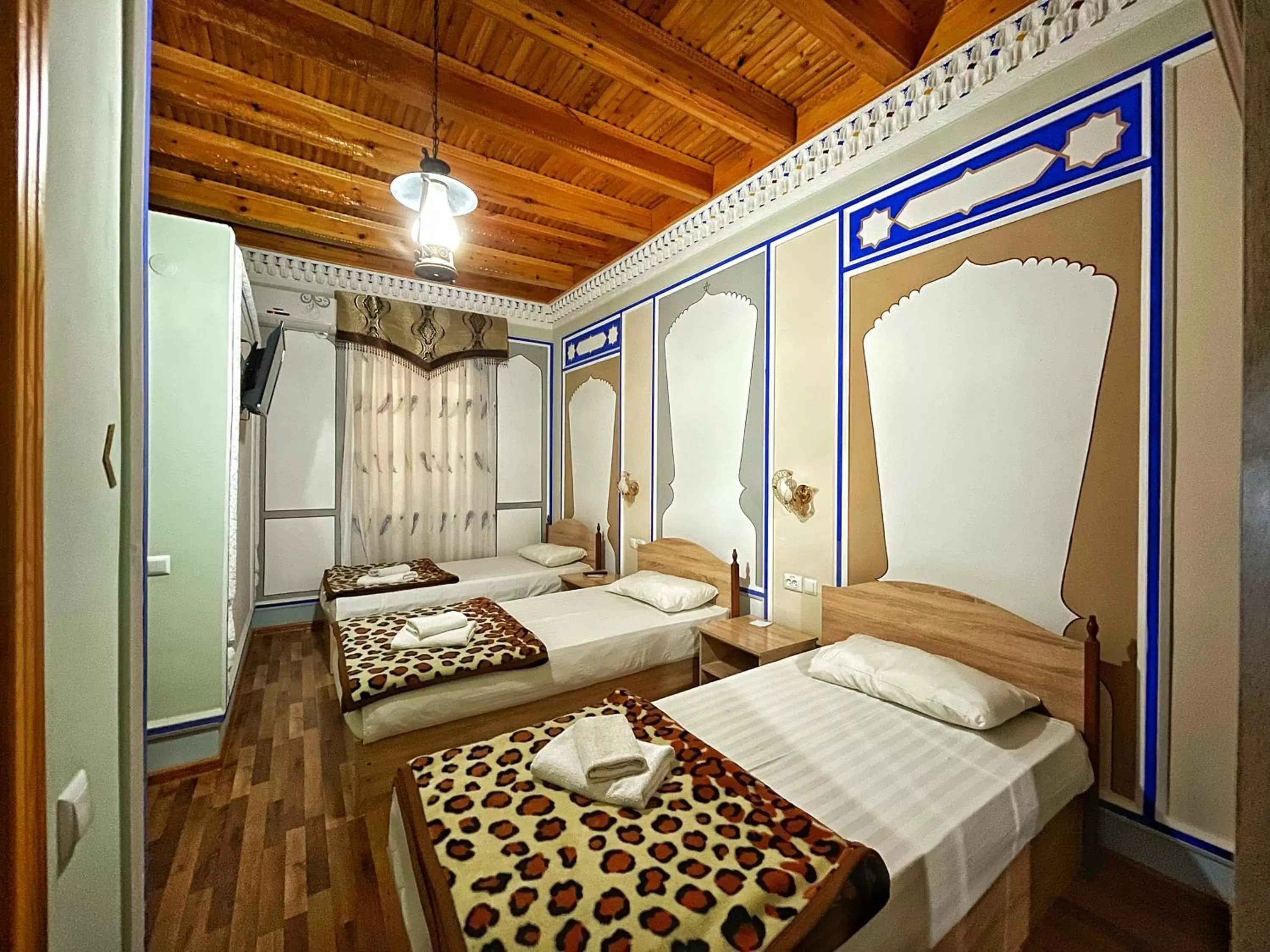 Standard Triple Room in Nurafshon Boutique Standard Triple Room in Nurafshon Boutique