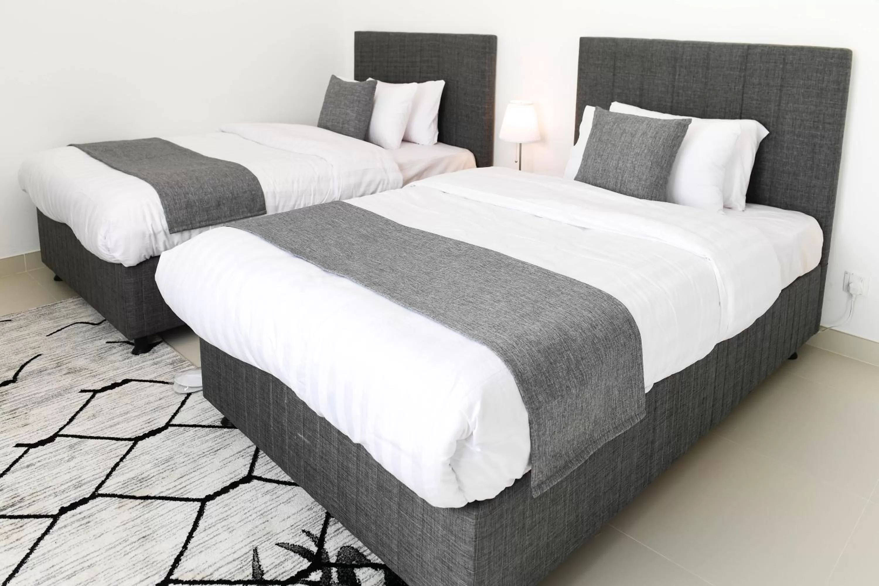 Bed in Noor Amwaj Hotel & Apartment