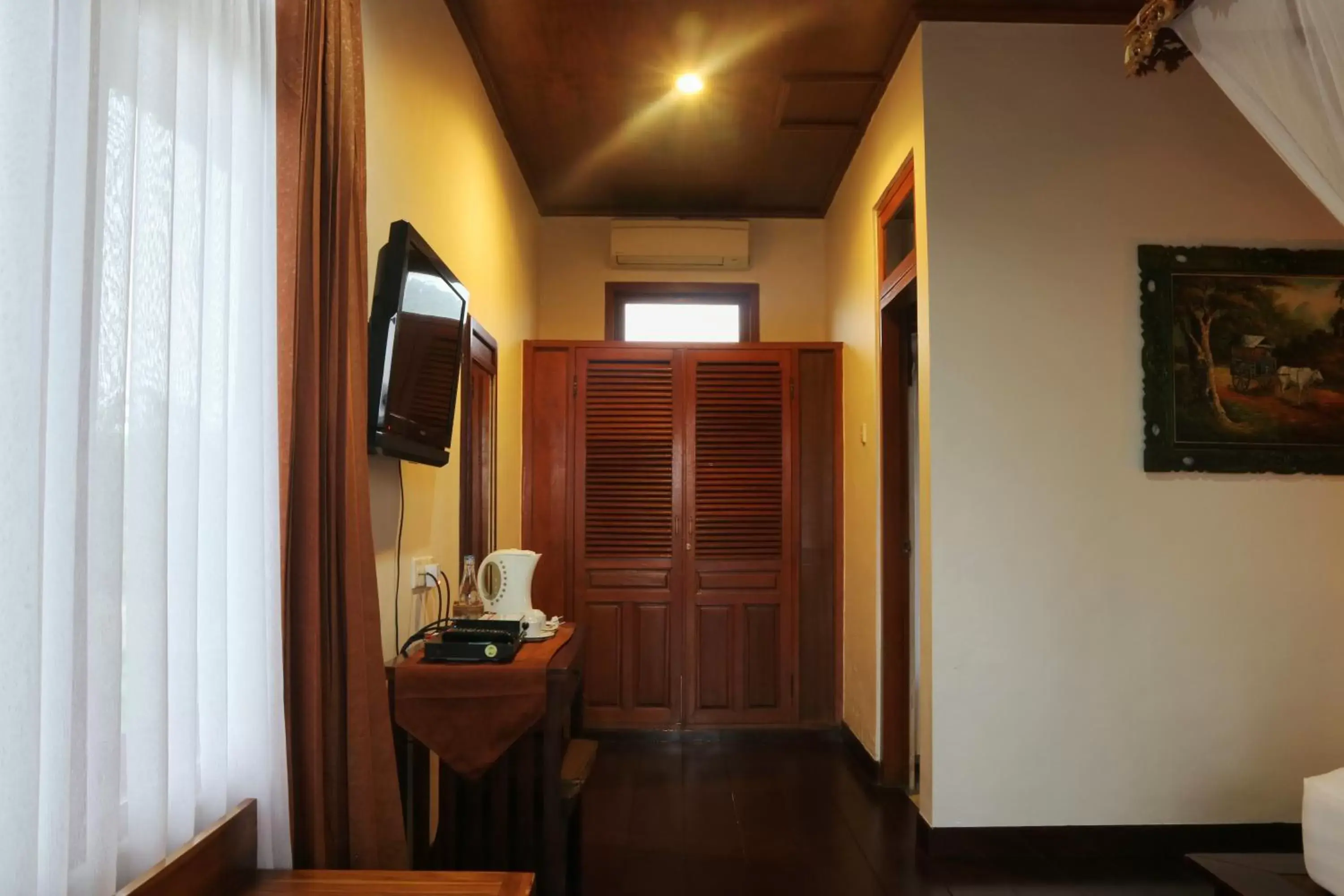 Bedroom, TV/Entertainment Center in Saren Indah Hotel - CHSE Certified