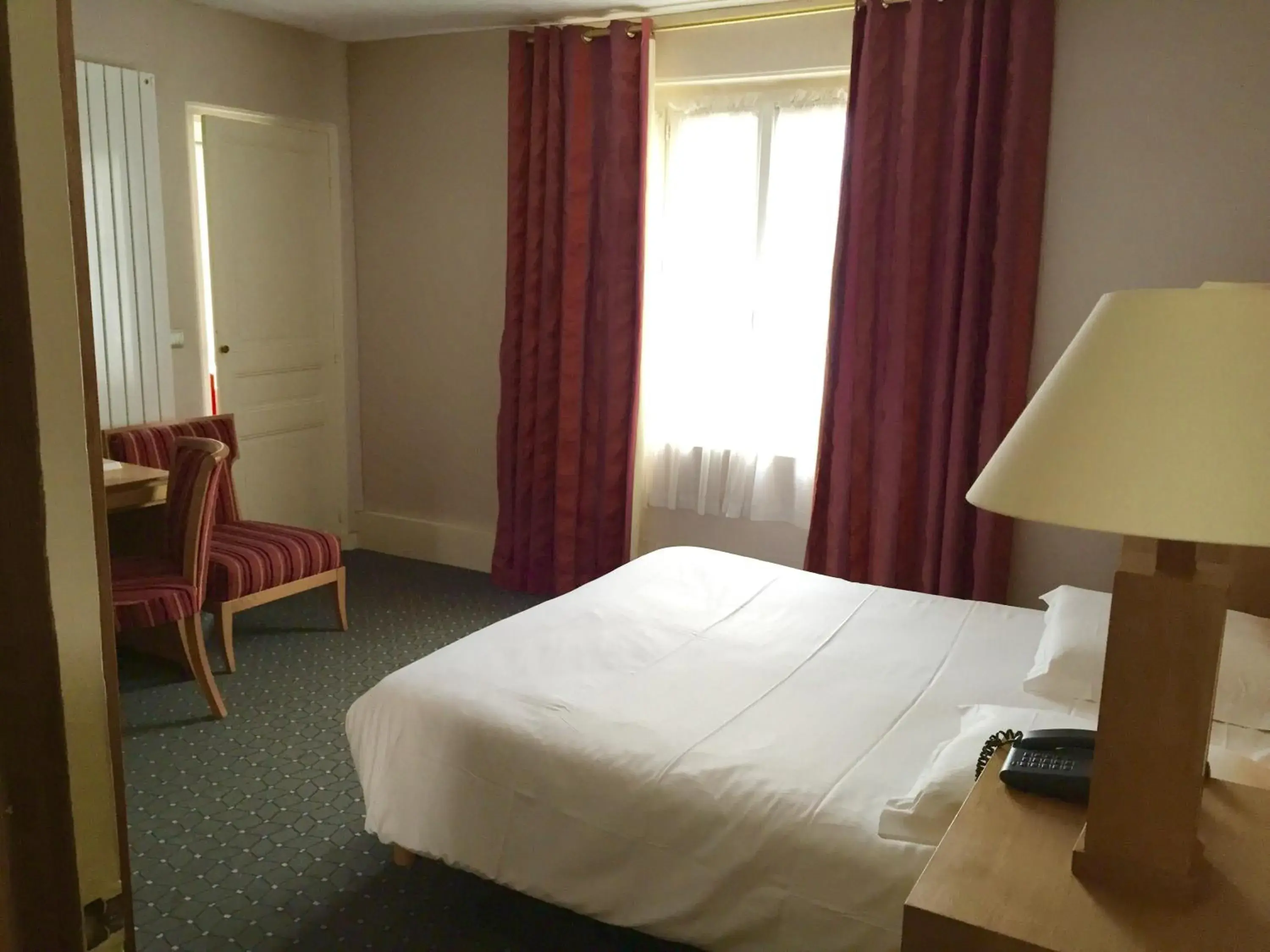 Photo of the whole room, Bed in Hotel de Normandie