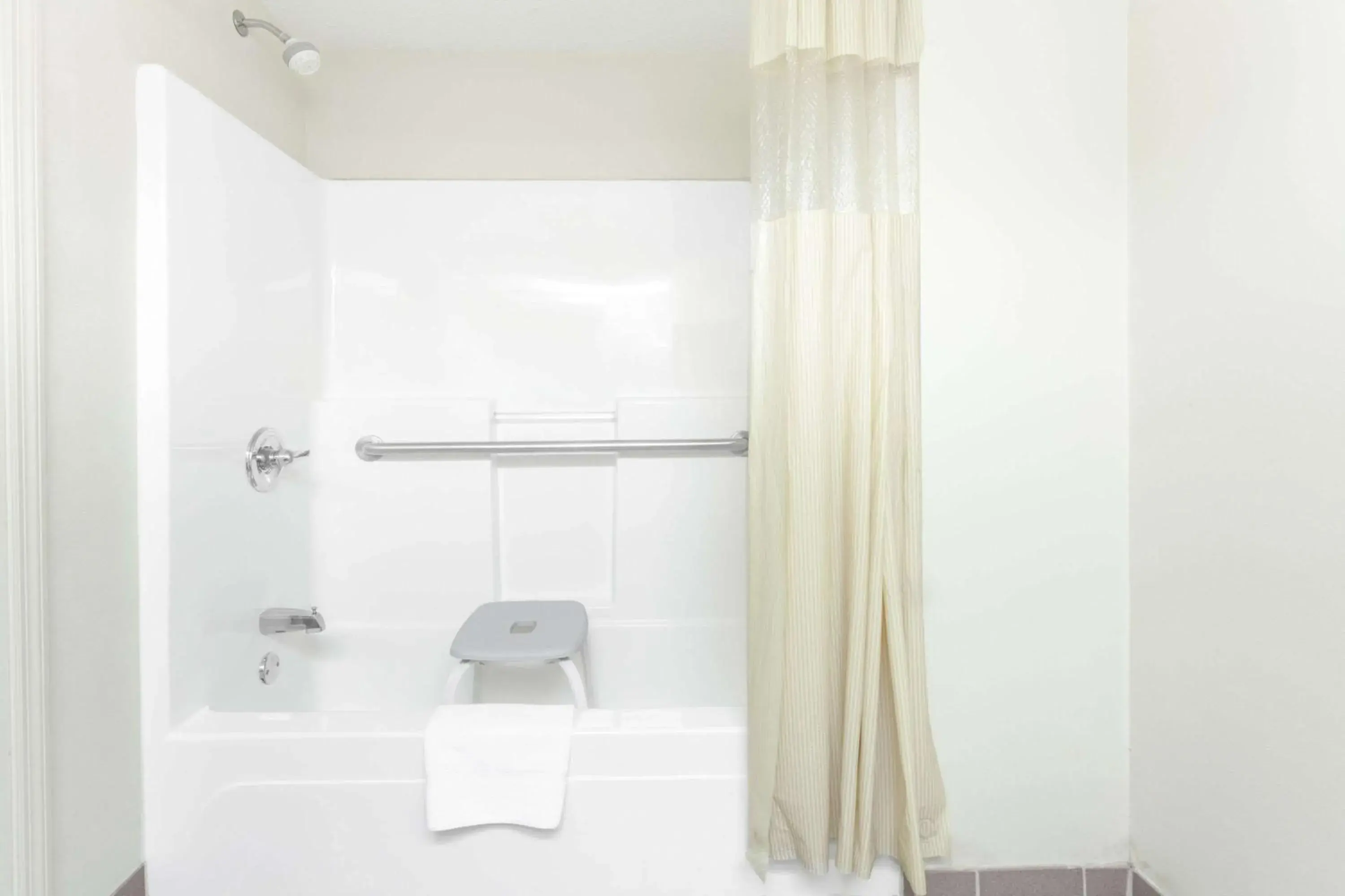 Bathroom in Days Inn & Suites by Wyndham Huntsville