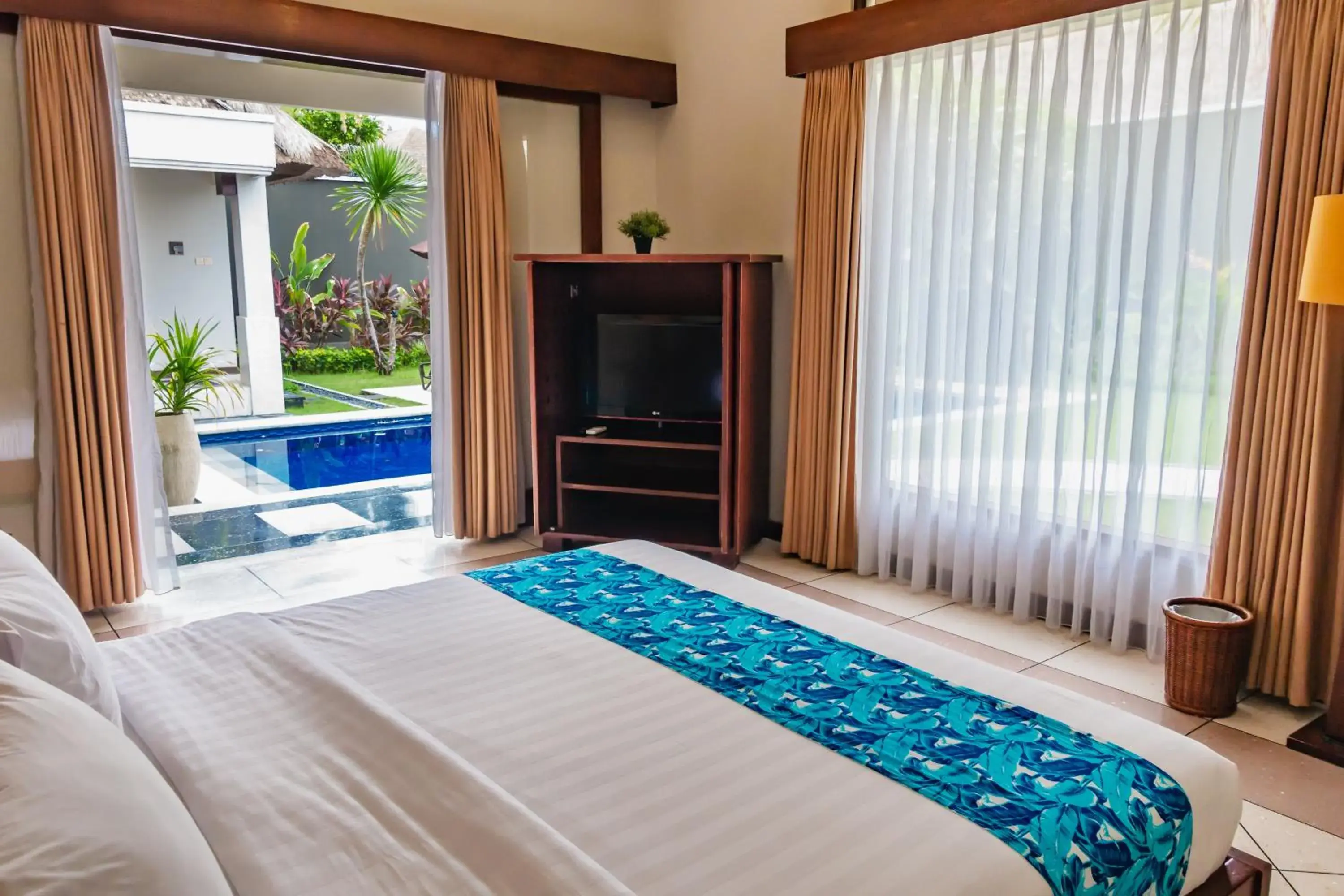 Bed in The Mutiara Jimbaran Boutique Villas