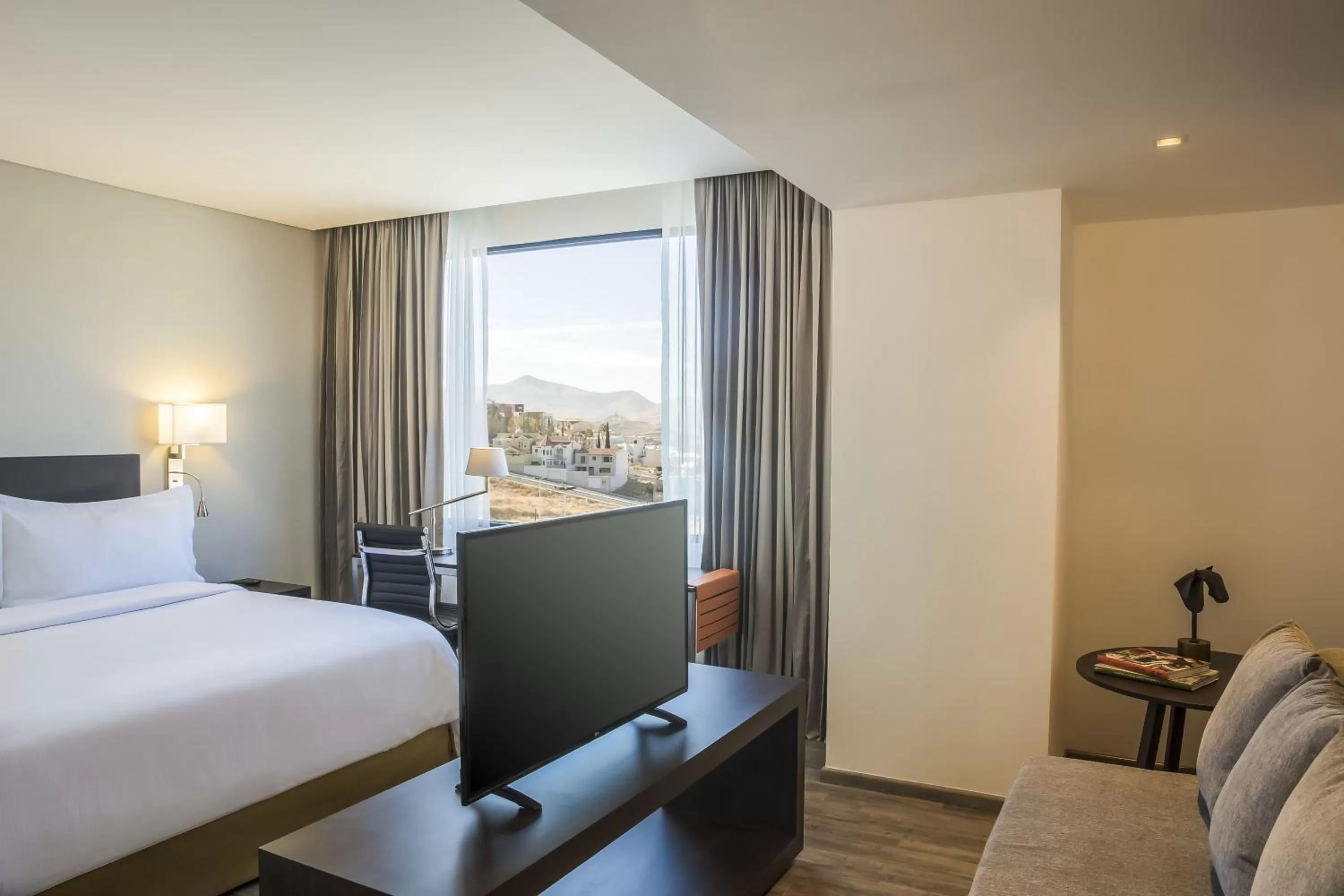 Photo of the whole room, Bed in Fiesta Inn Chihuahua Fashion Mall