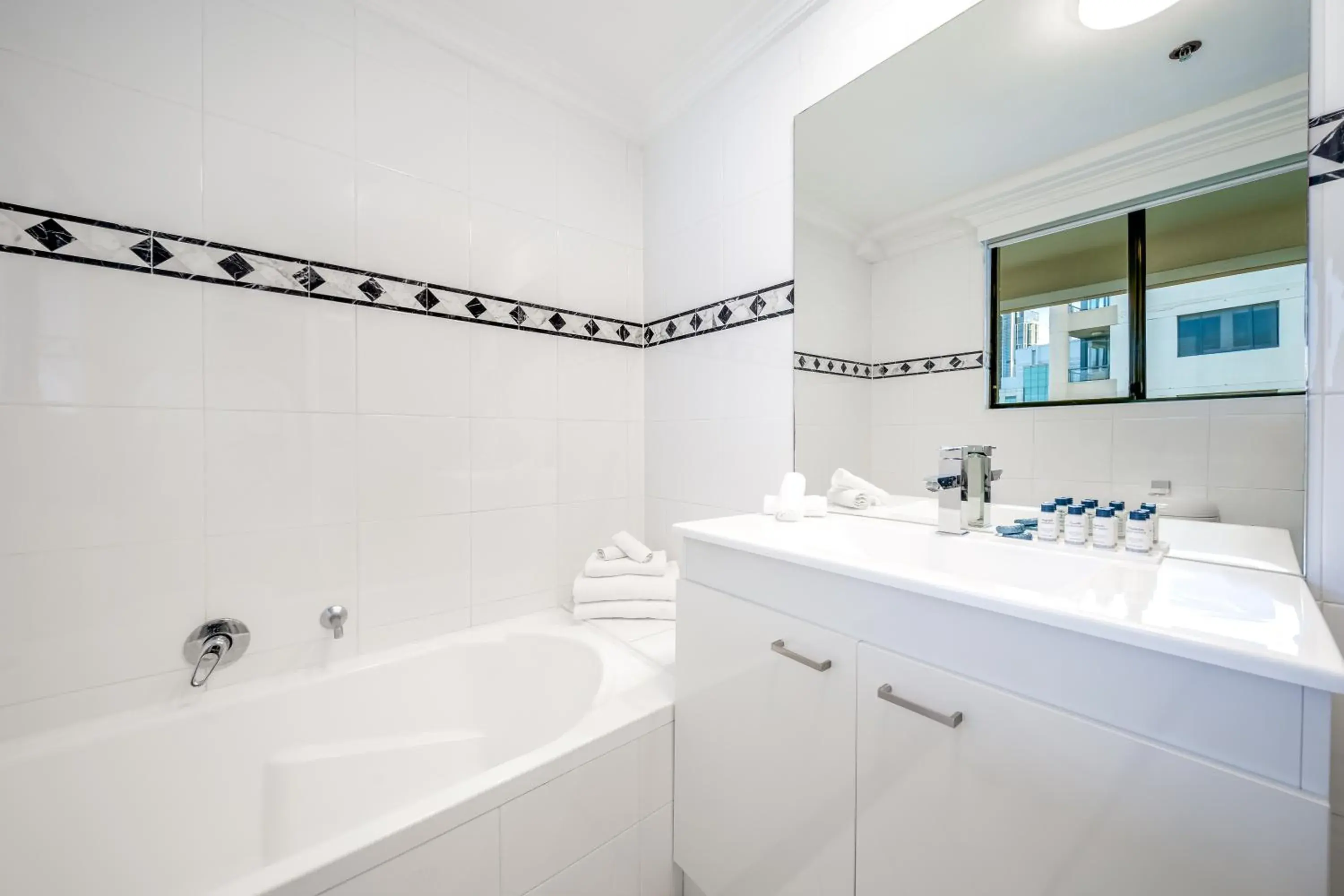 Bathroom in Oaks Sydney Castlereagh Suites