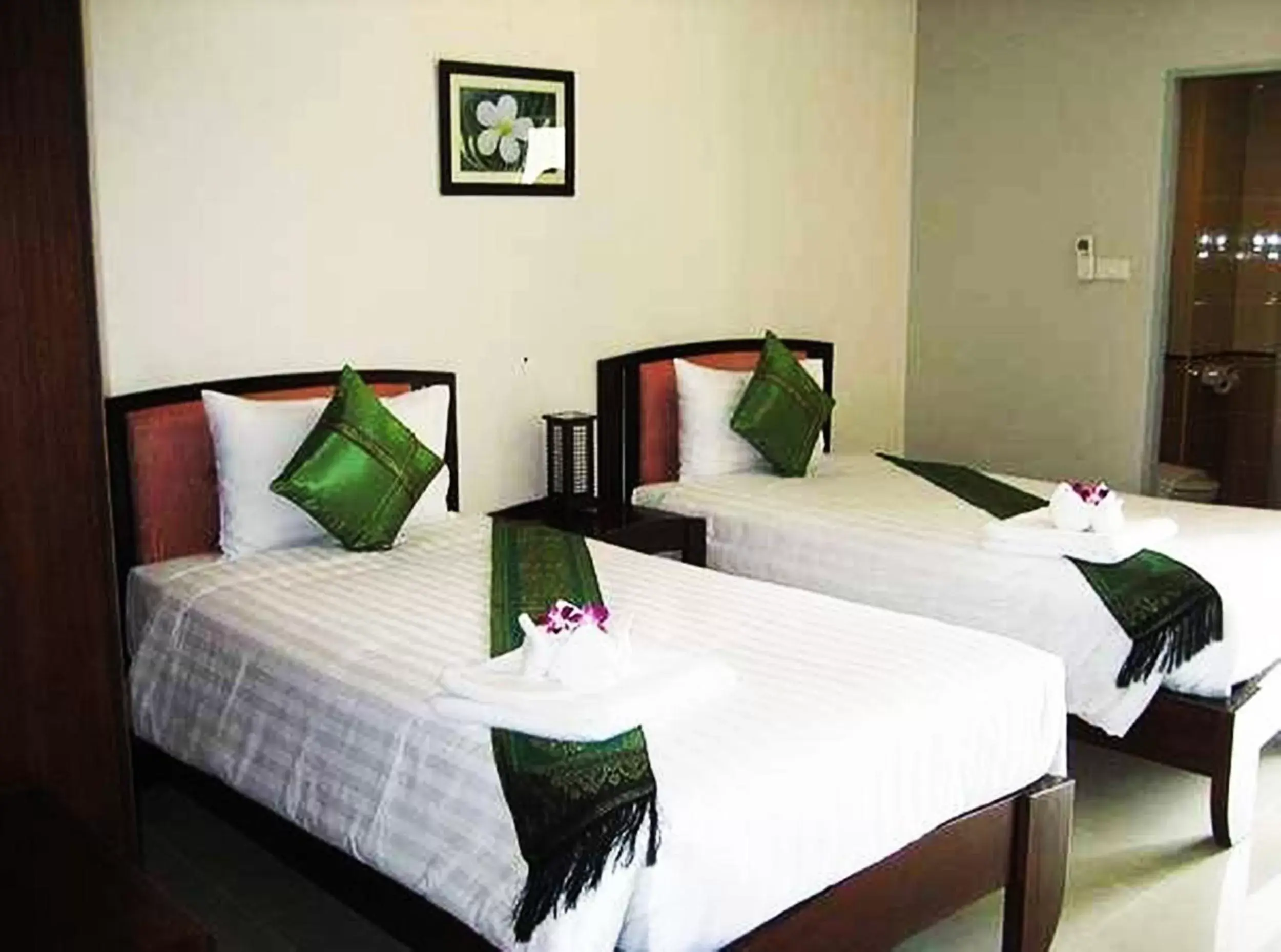 Bed in Narawan Hotel, Hua Hin