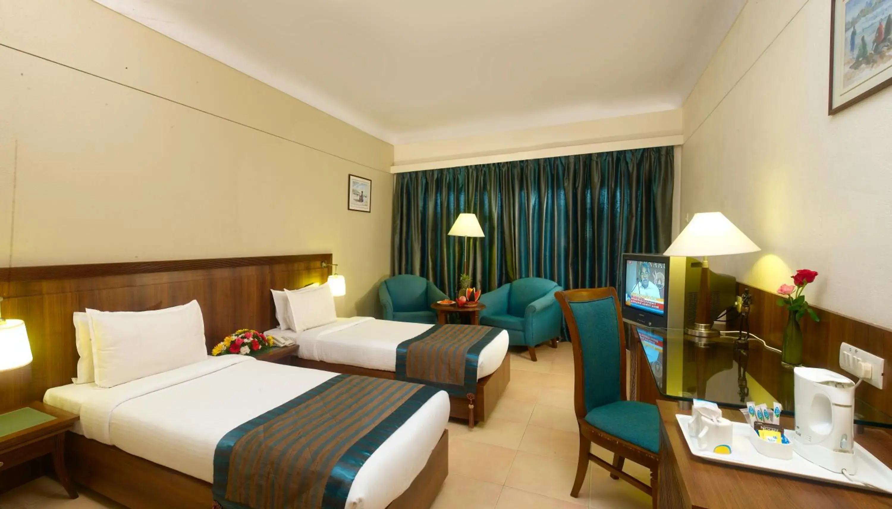 Bed in Uday Samudra Leisure Beach Hotel