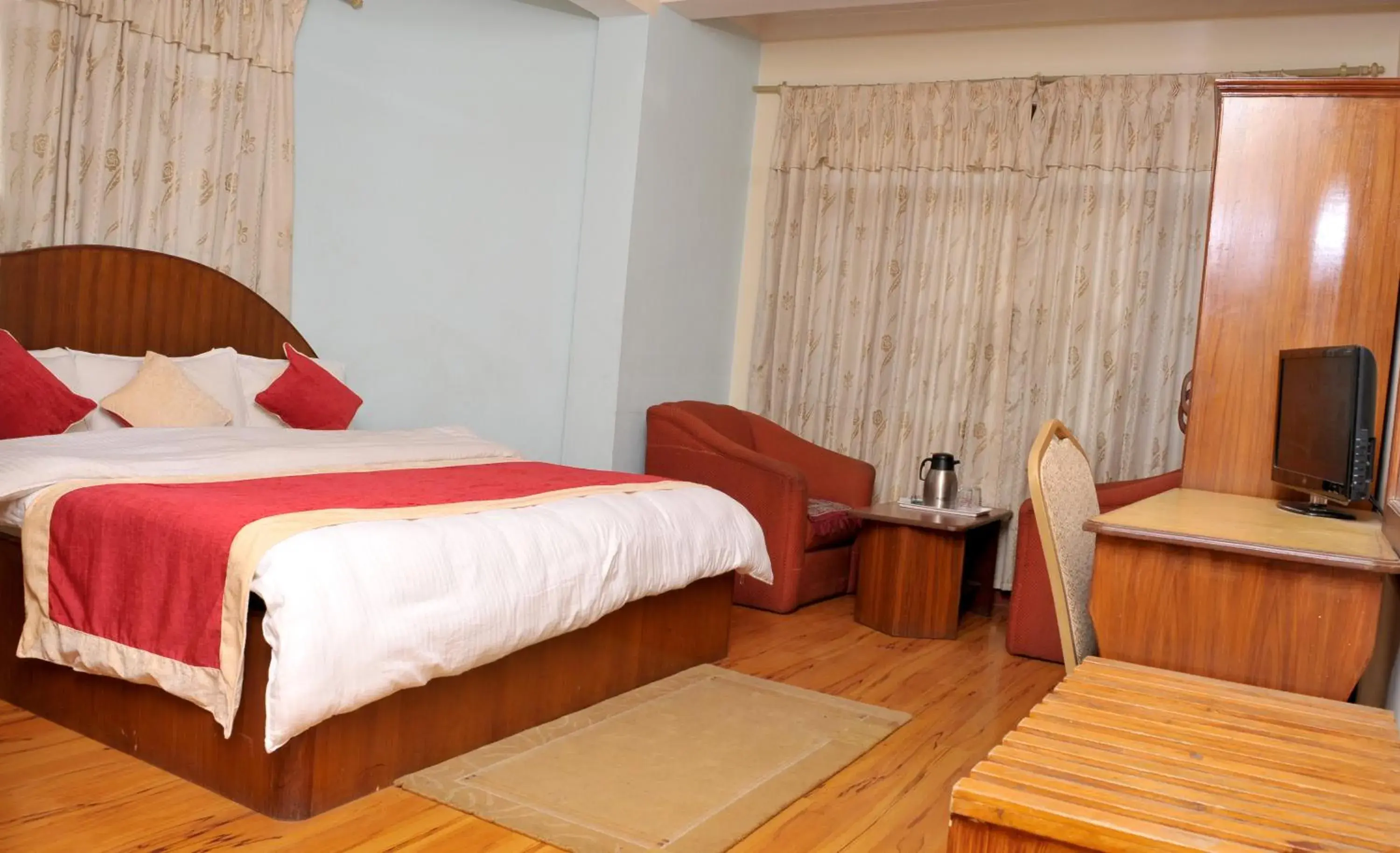 Photo of the whole room, Bed in Hotel Brihaspati