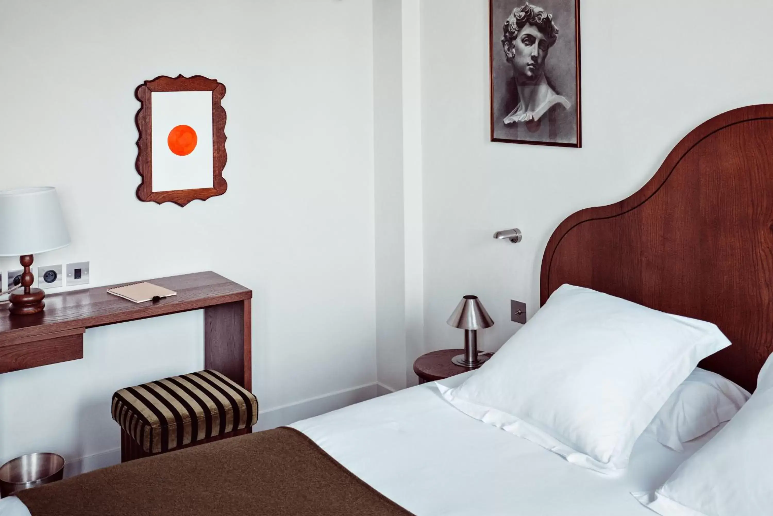 Decorative detail, Bed in Hotel des Académies et des Arts Decorative detail, Bed in Hotel des Académies et des Arts