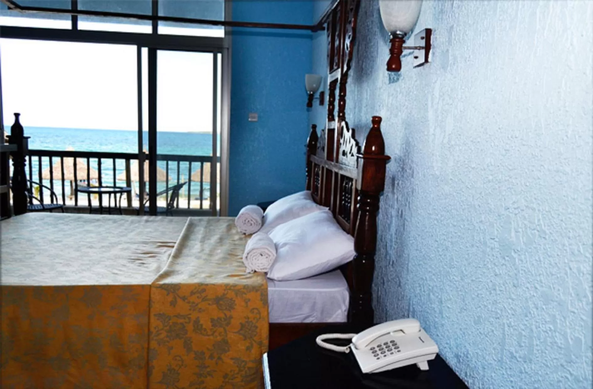 Bed in Serene Beach Resort