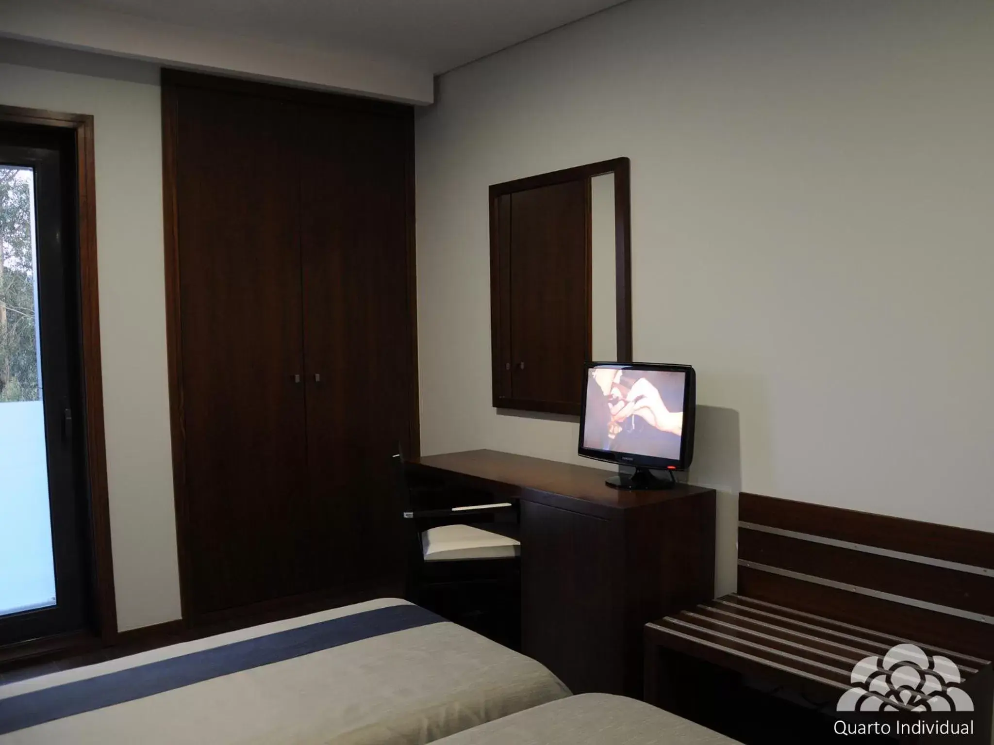Photo of the whole room, TV/Entertainment Center in Hotel Portas De Santa Rita