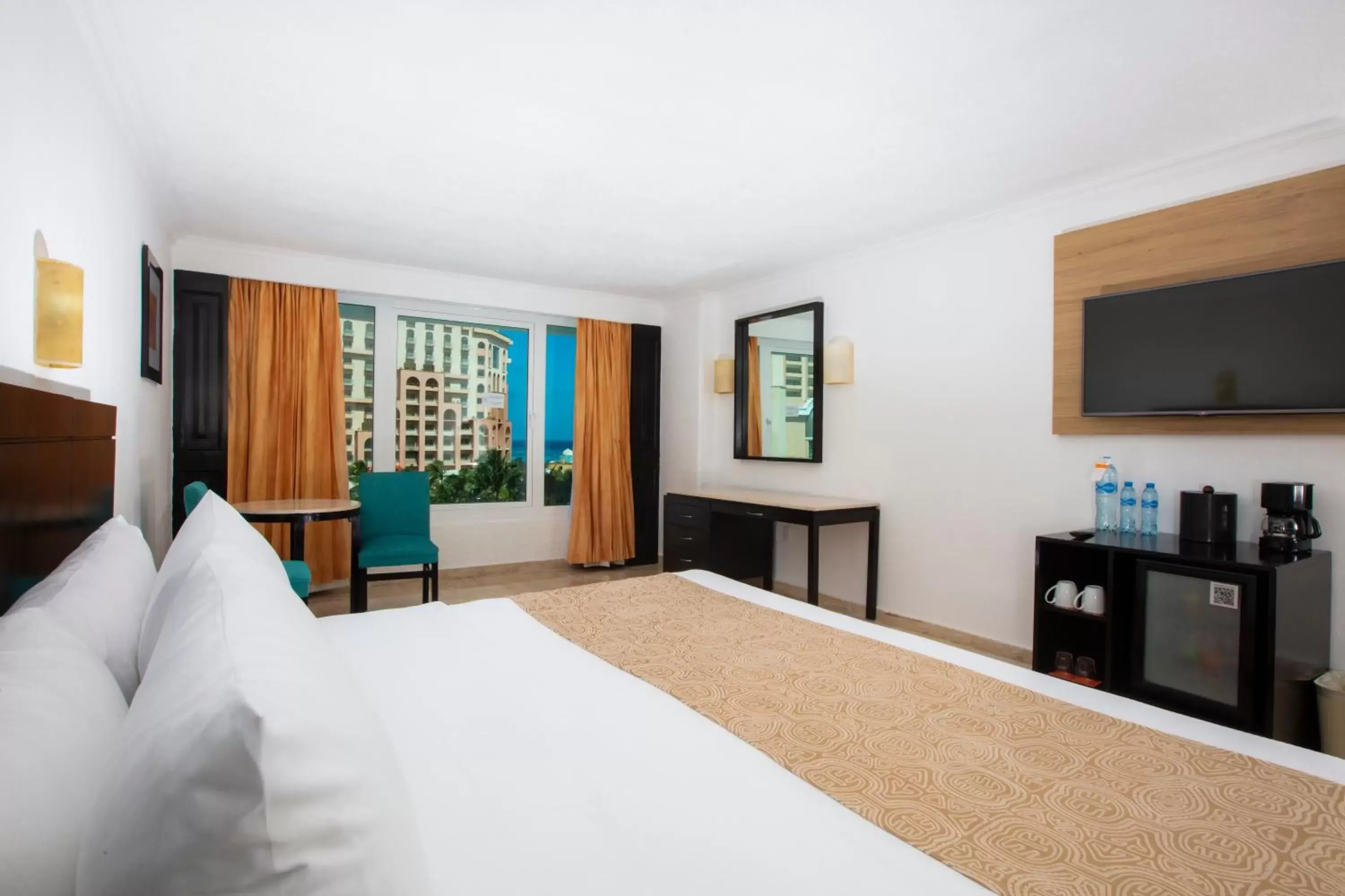 Bed, TV/Entertainment Center in Krystal Cancun