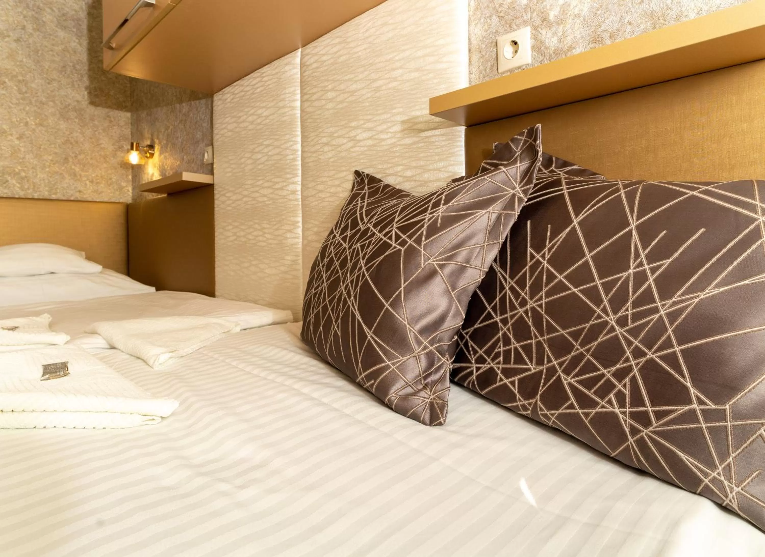 Bed in Teátrum Boutique Hotel