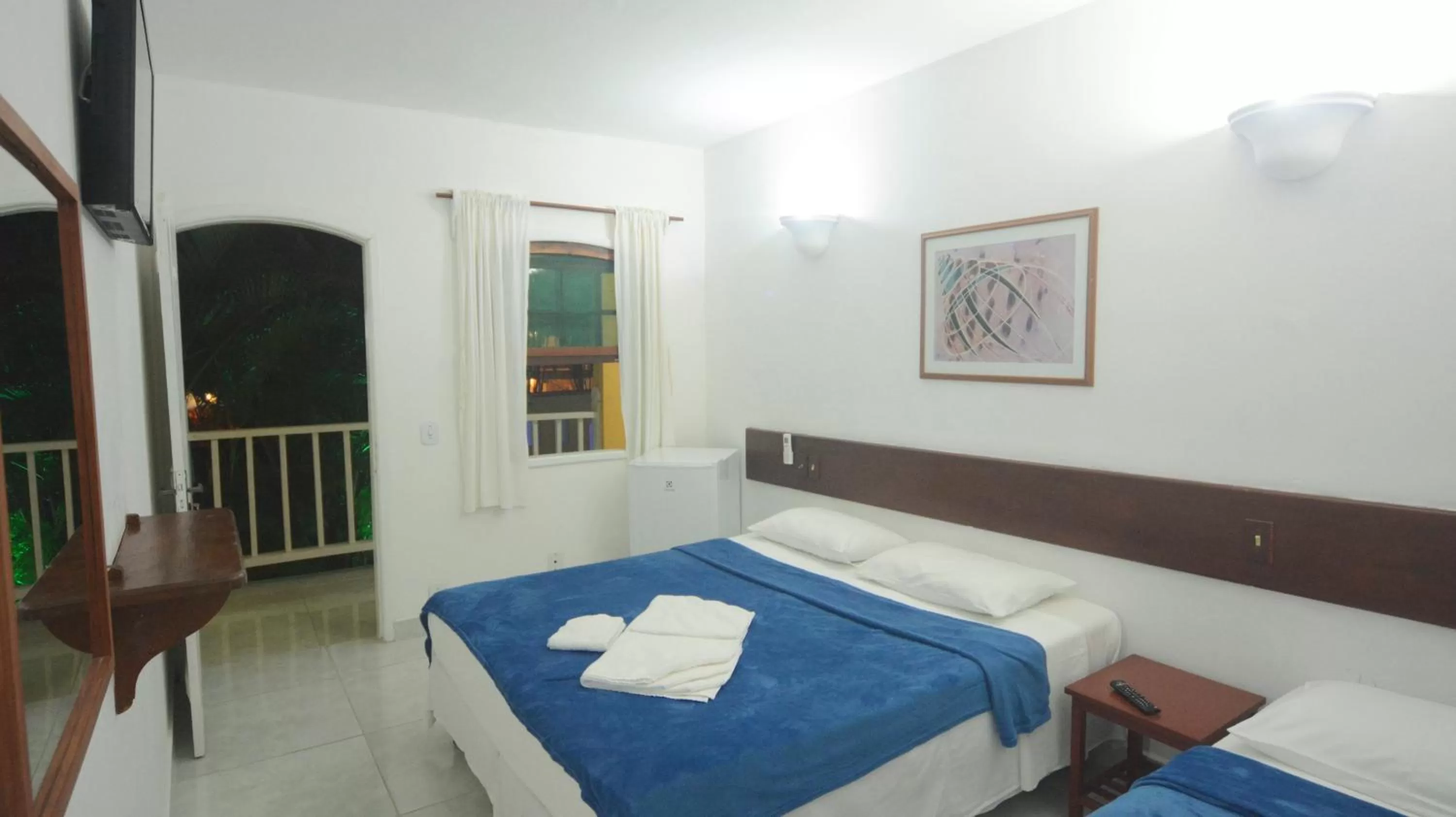 Bed in Pousada Estrela de Paraty