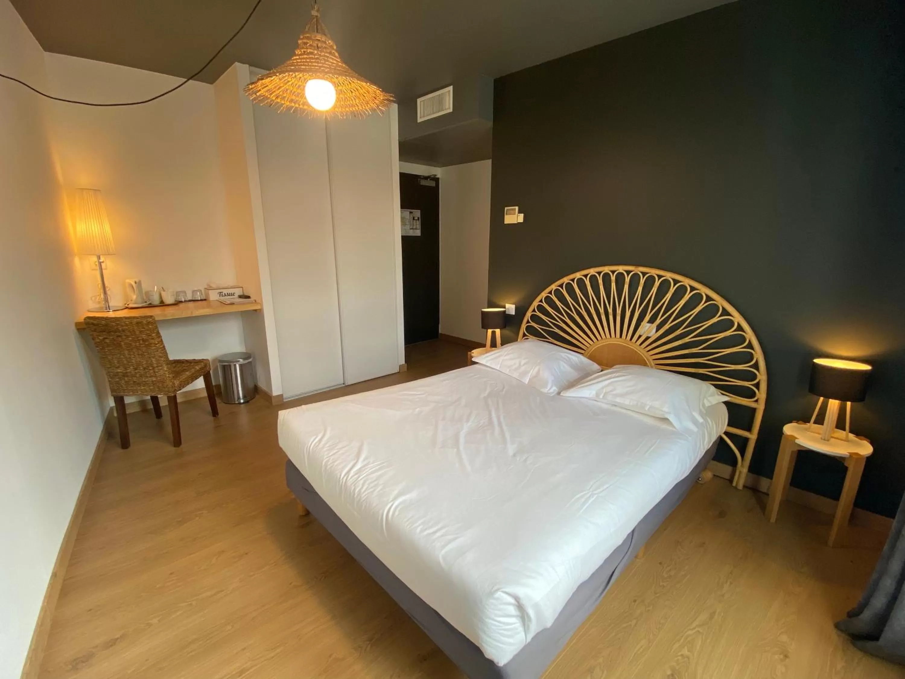 Bedroom in Le Miredames Hôtel-Bar