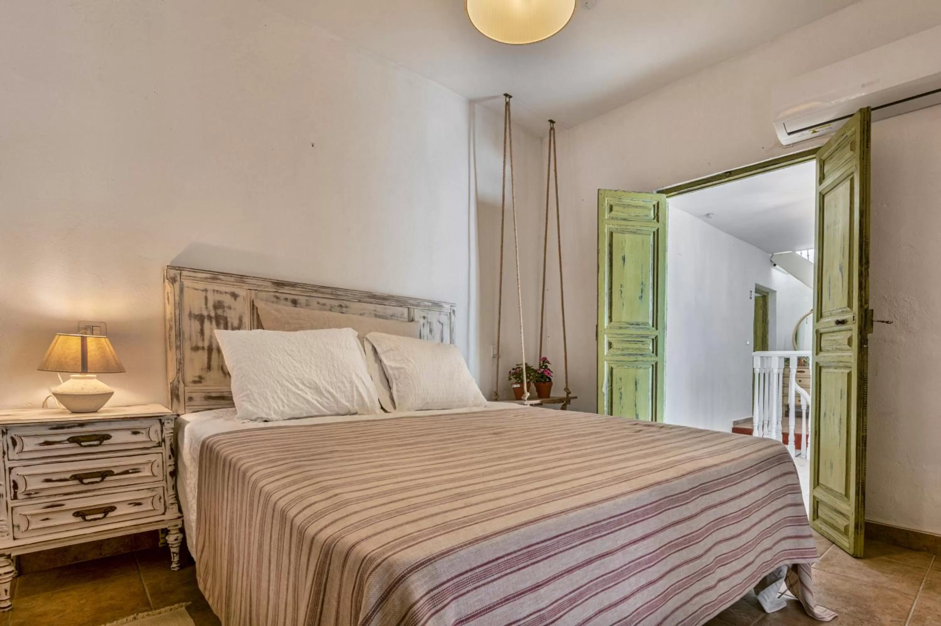 Bed in Encanto Guesthouse