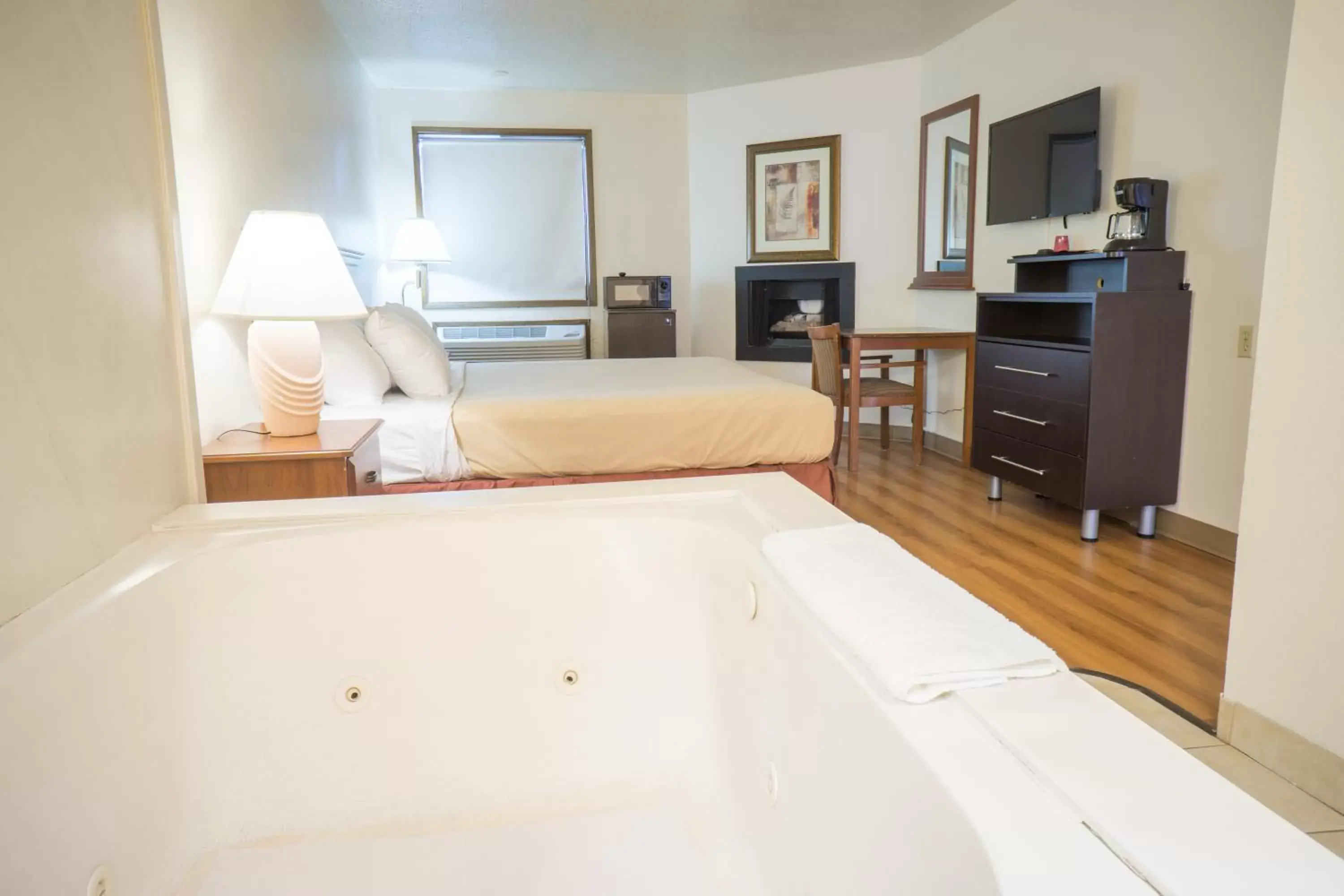 Bedroom in Sunnyside Inn and Suites