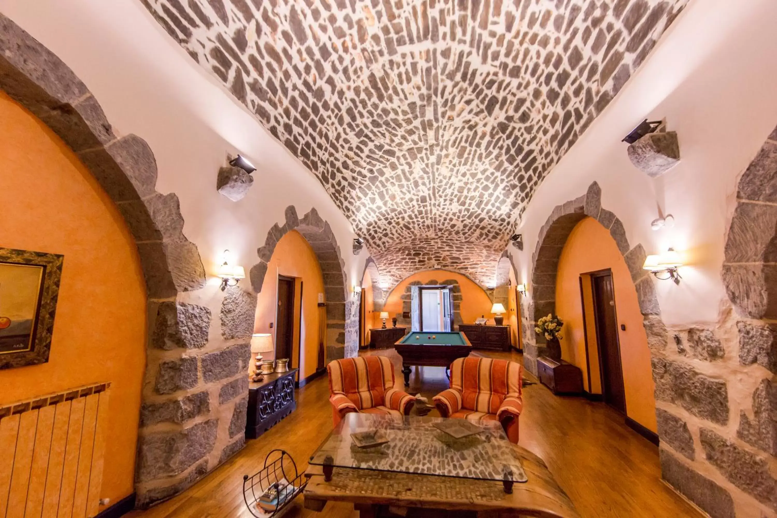 Communal lounge/ TV room, Seating Area in Hotel Larrañaga