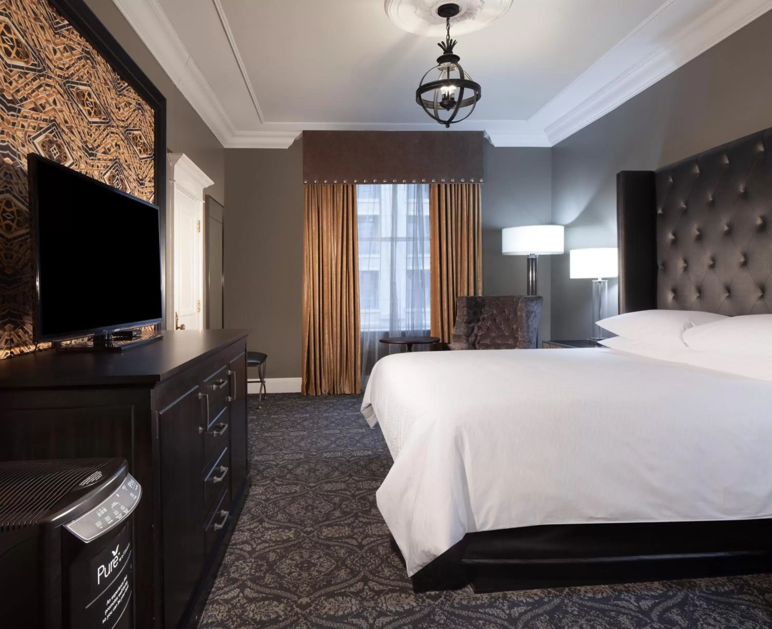 Photo of the whole room, TV/Entertainment Center in Le Pavillon New Orleans