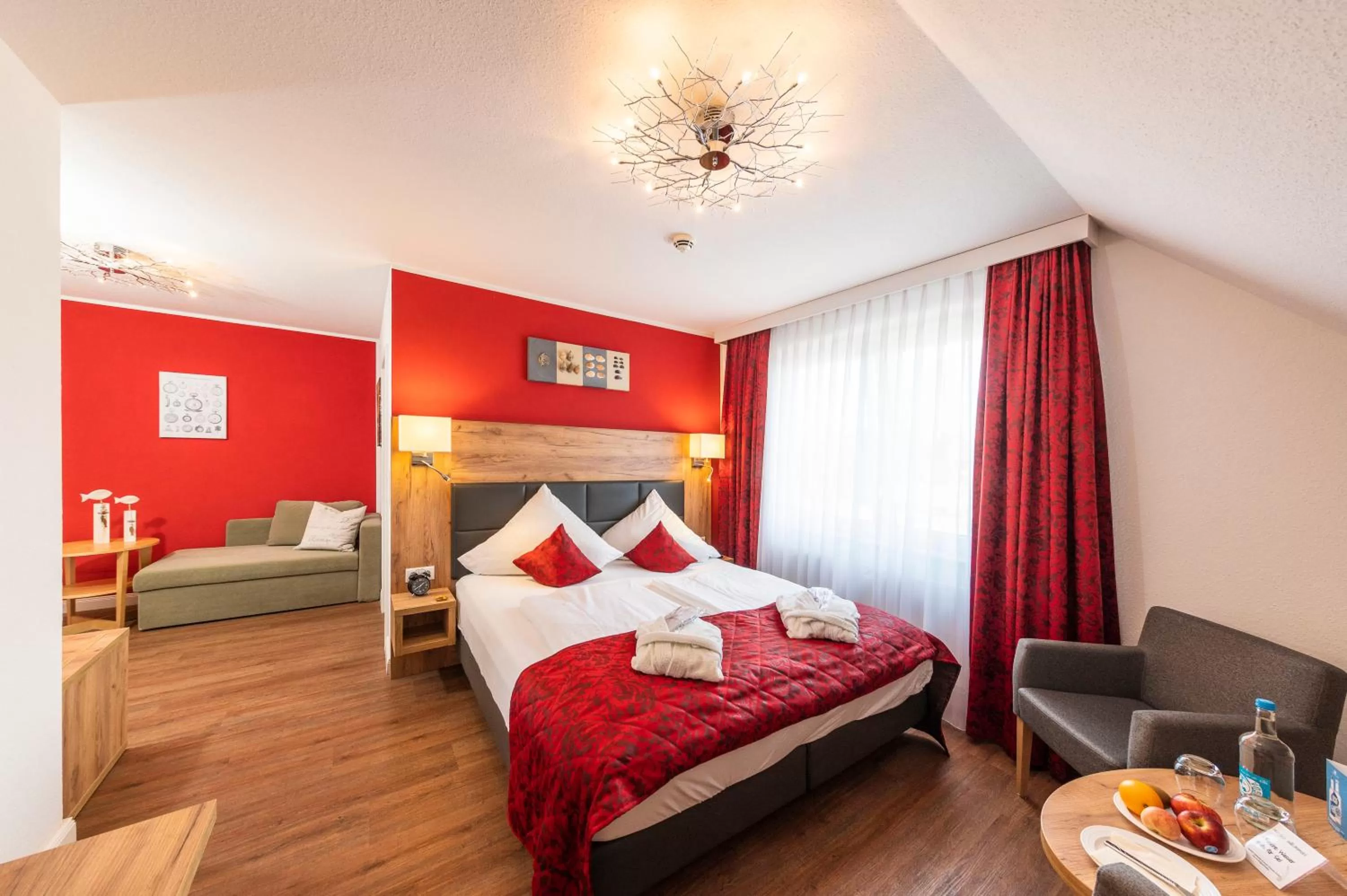 Living room, Bed in Hotel Das kleine Glück - Adults Only