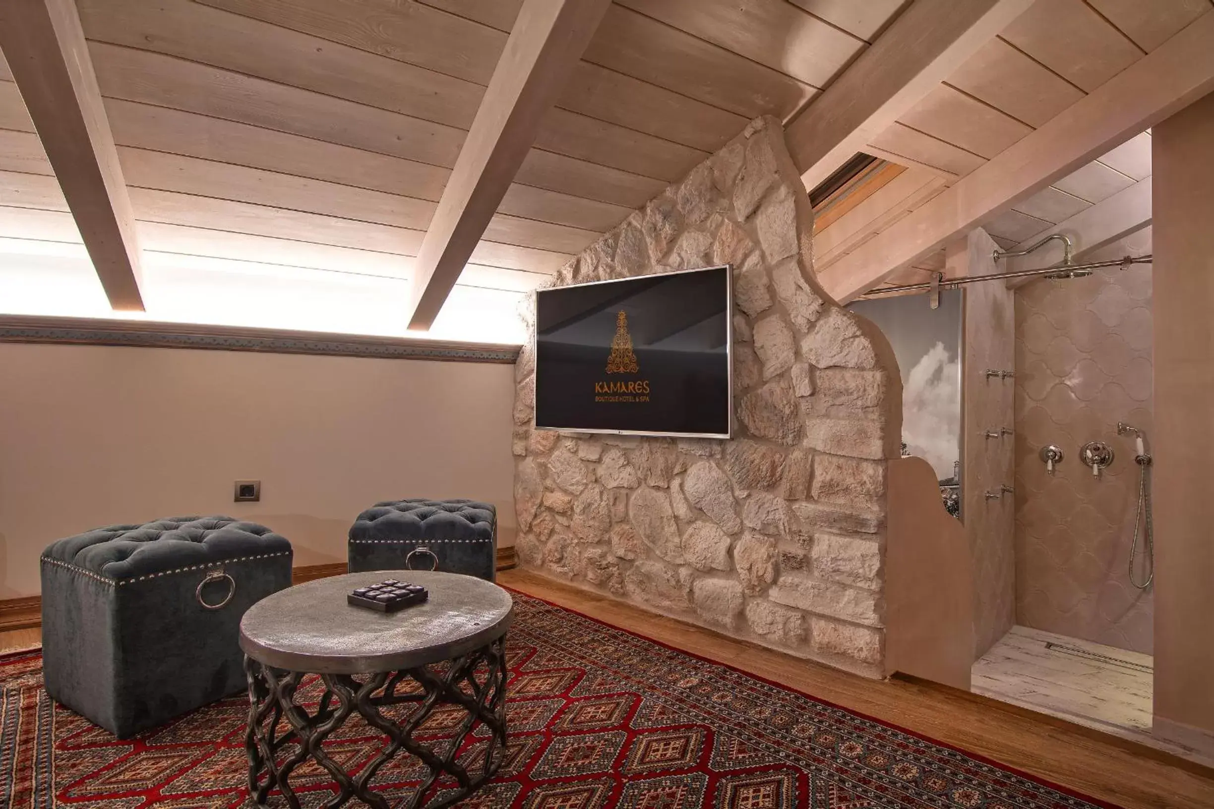 Bathroom, TV/Entertainment Center in KAMARES Historic Boutique Hotel & Spa