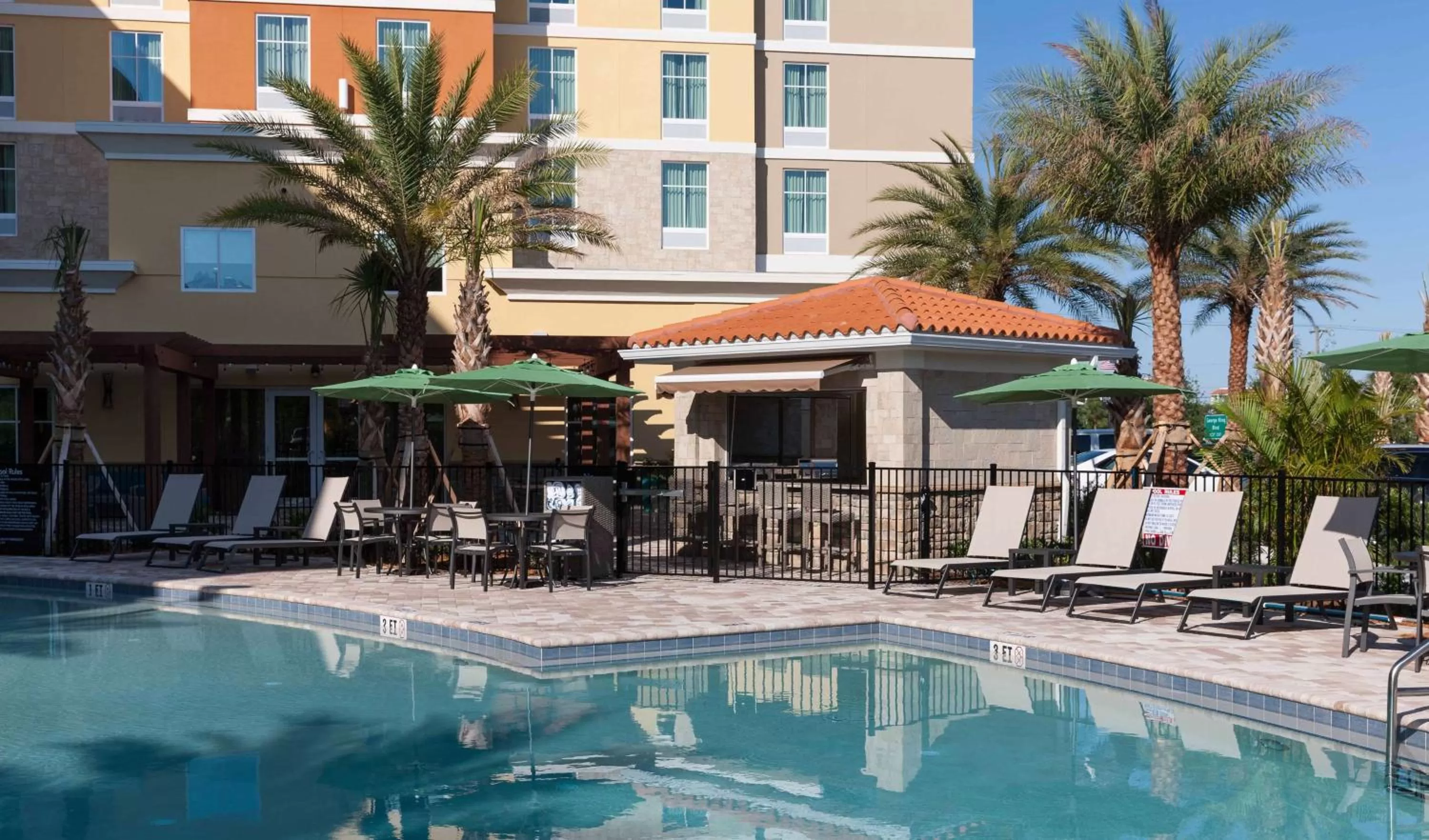 Pool view in Homewood Suites by Hilton Cape Canaveral-Cocoa Beach