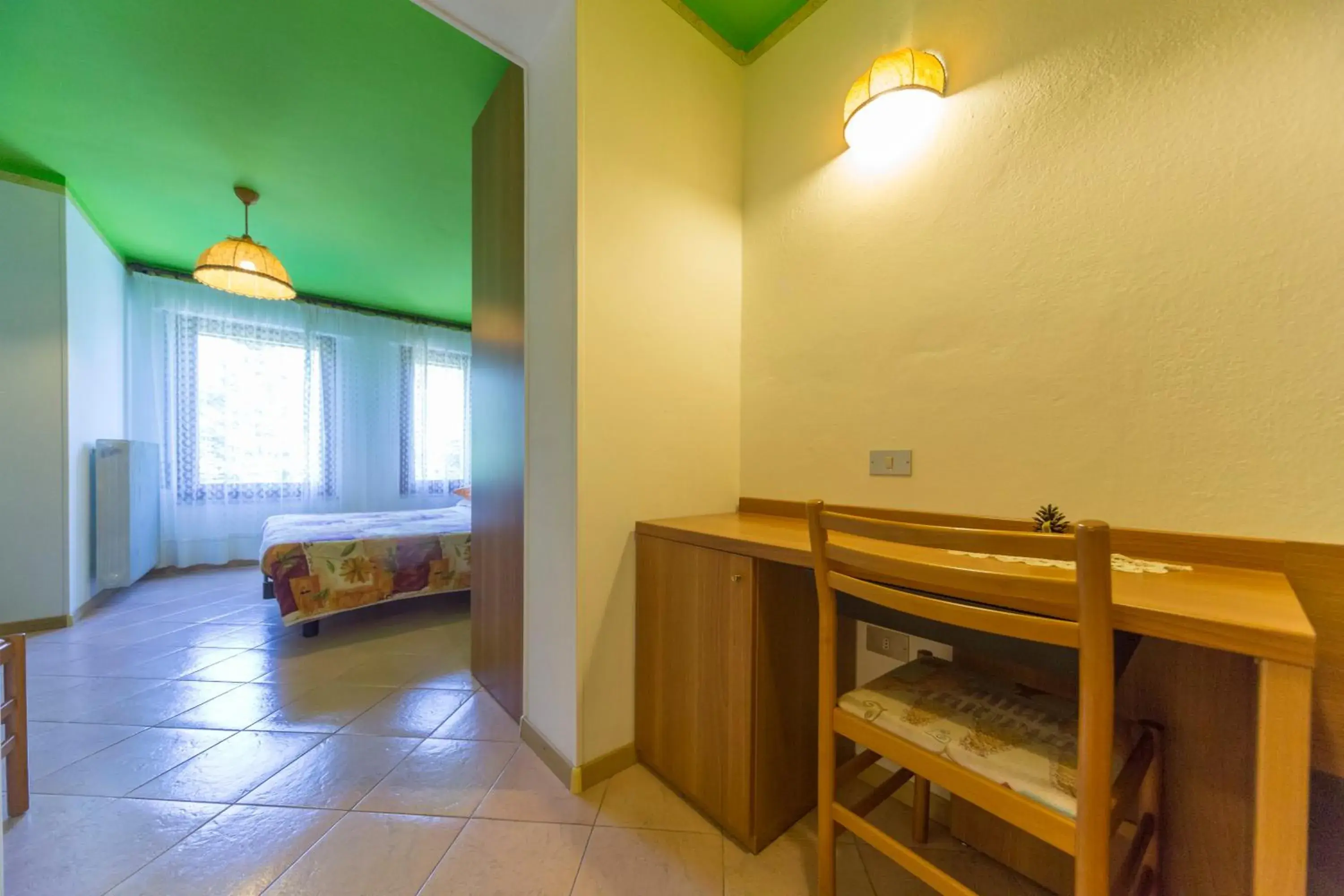 Bedroom, Seating Area in Hotel Trentino