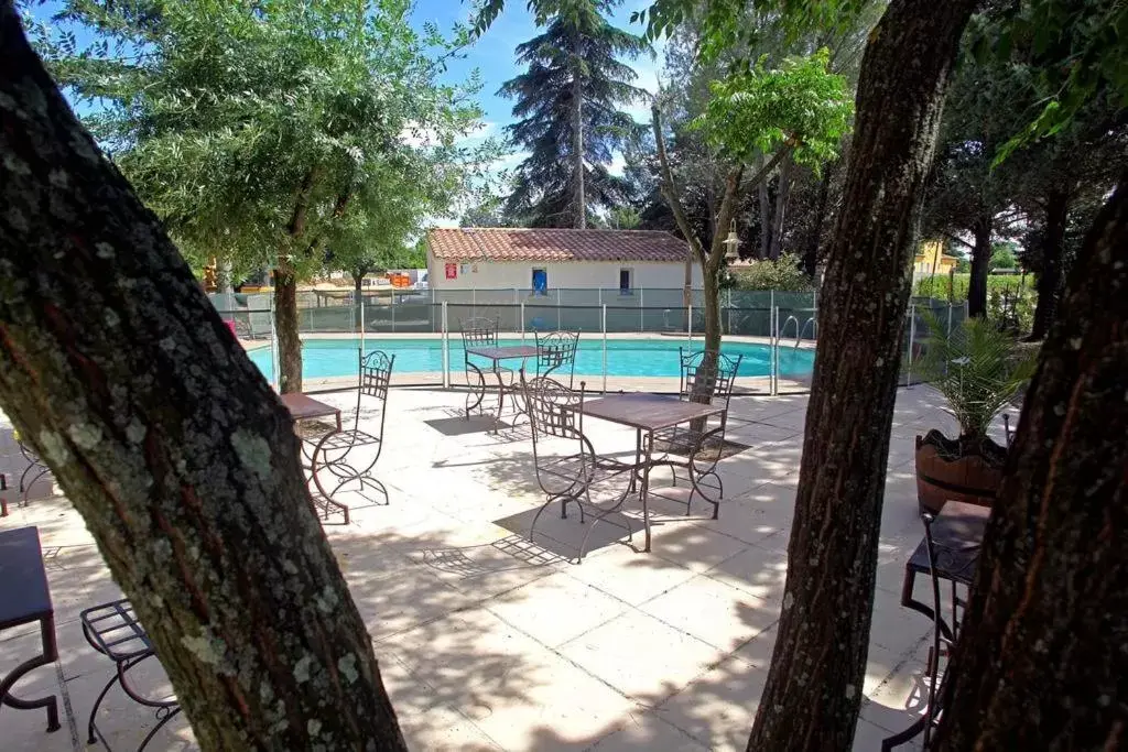 Pool View in Hotel Le Vieux Moulin