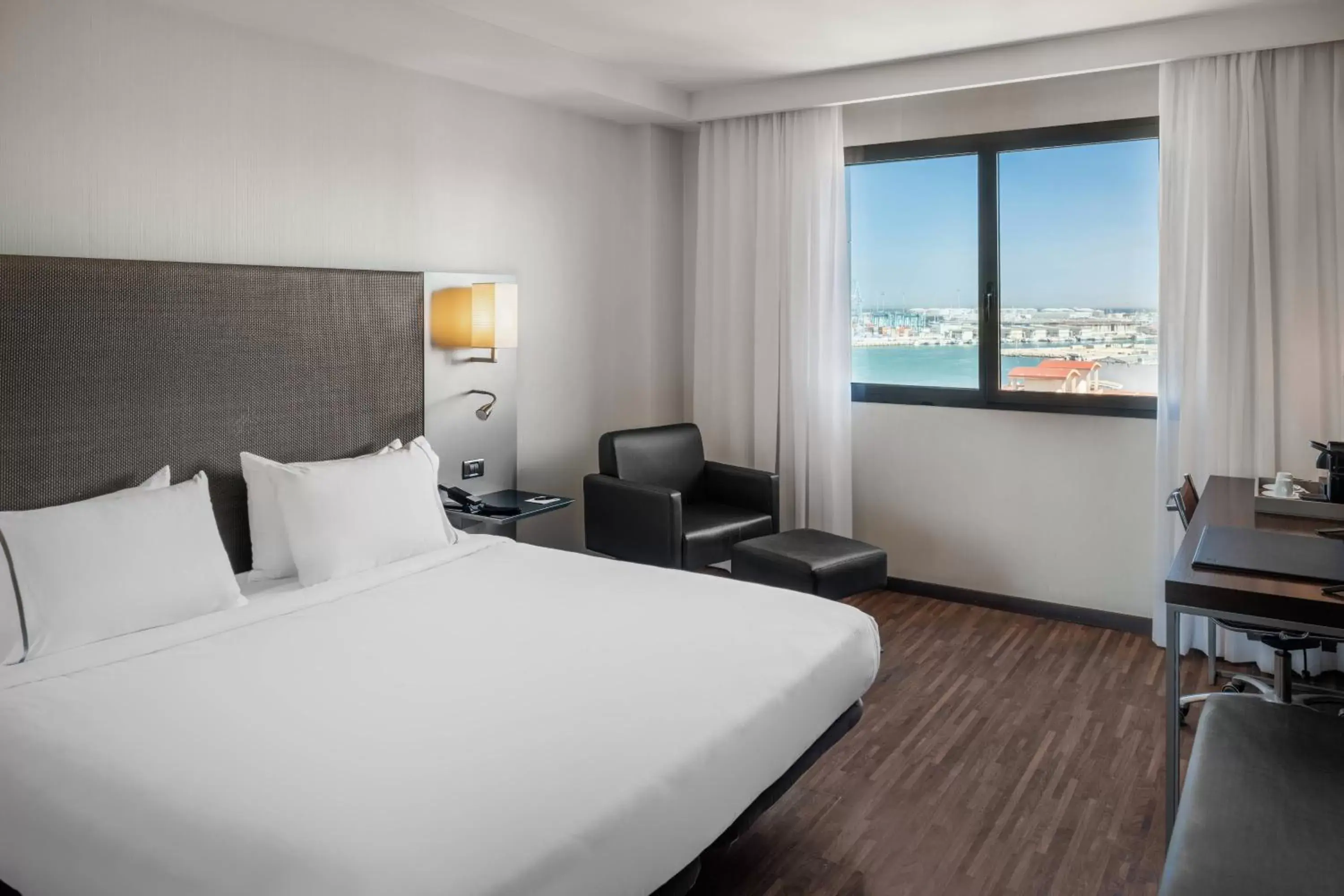 Photo of the whole room, Bed in AC Hotel Algeciras by Marriott
