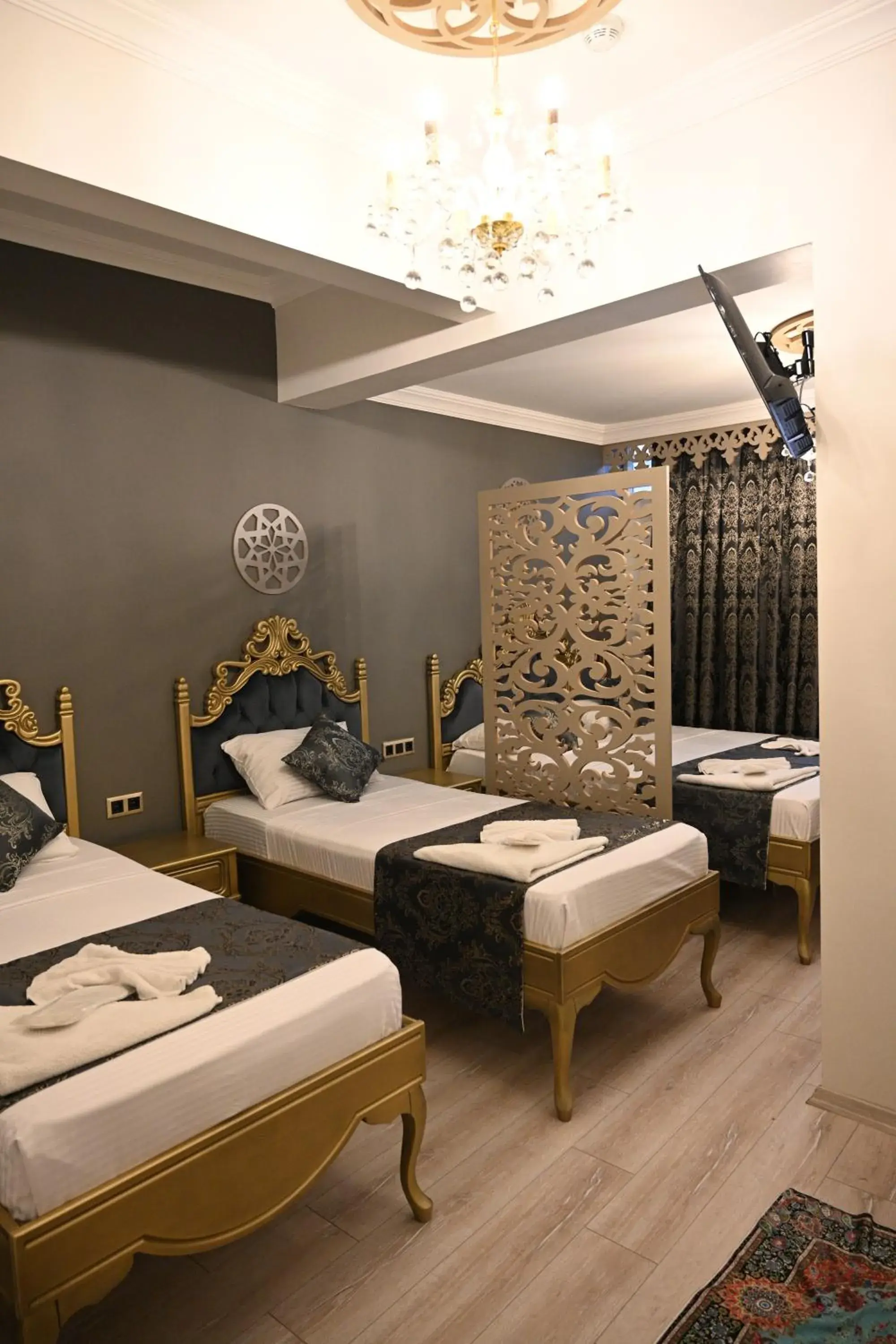 Bed in Ethnica Suites