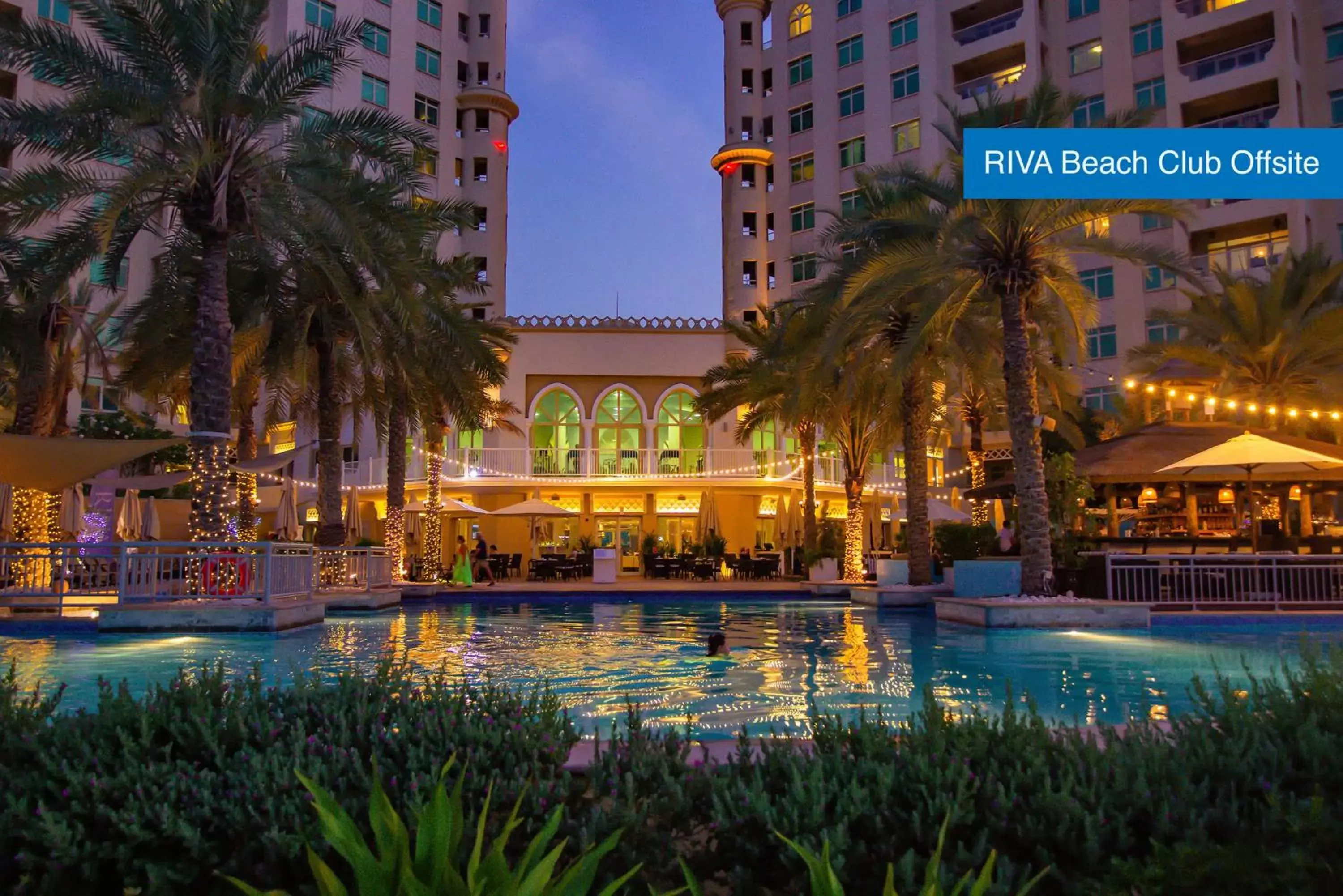 Pool view, Property Building in Mövenpick Hotel Jumeirah Lakes Towers Dubai