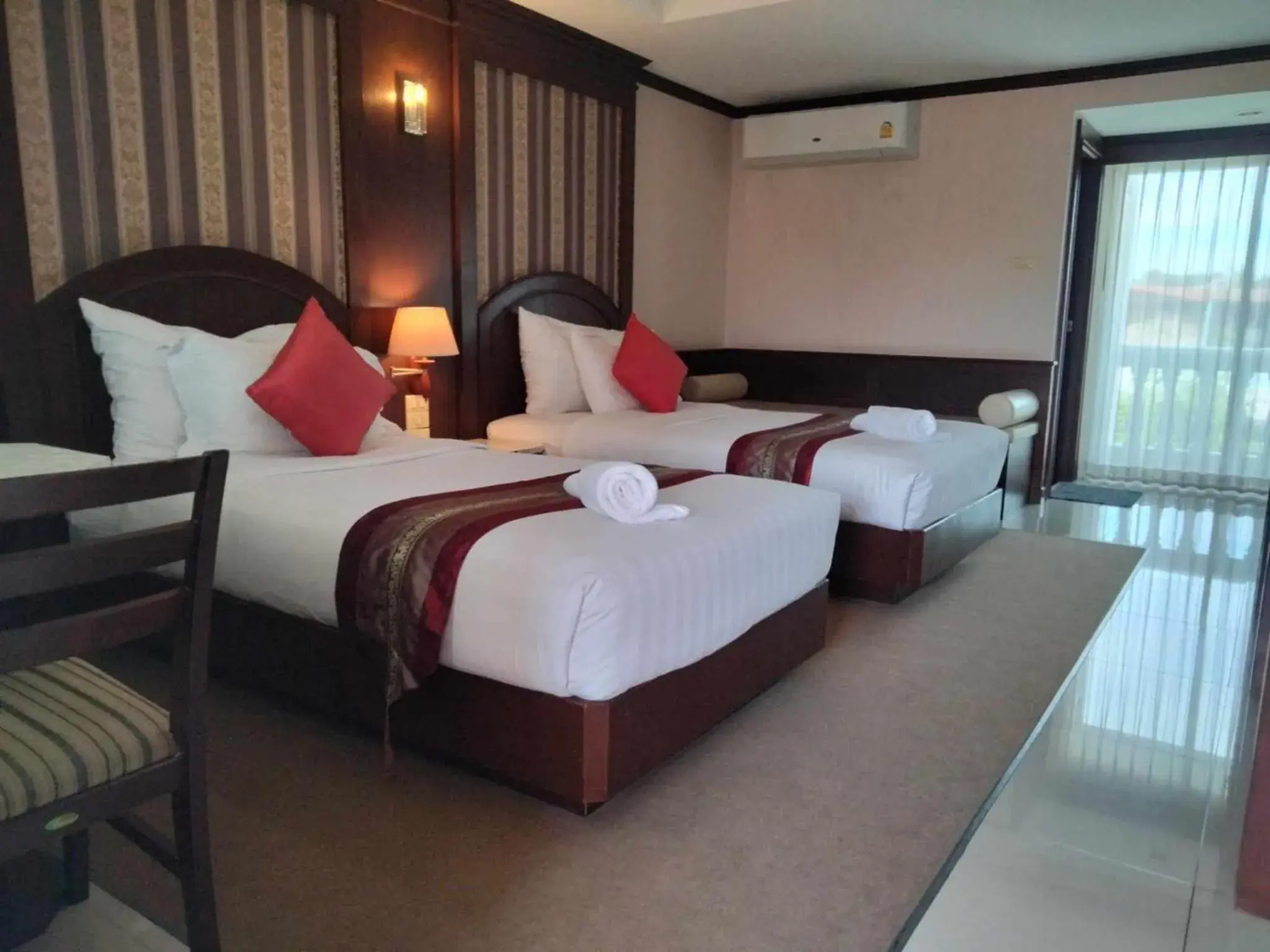 Bed in The Lion King Hotel Udonthani Bed in The Lion King Hotel Udonthani