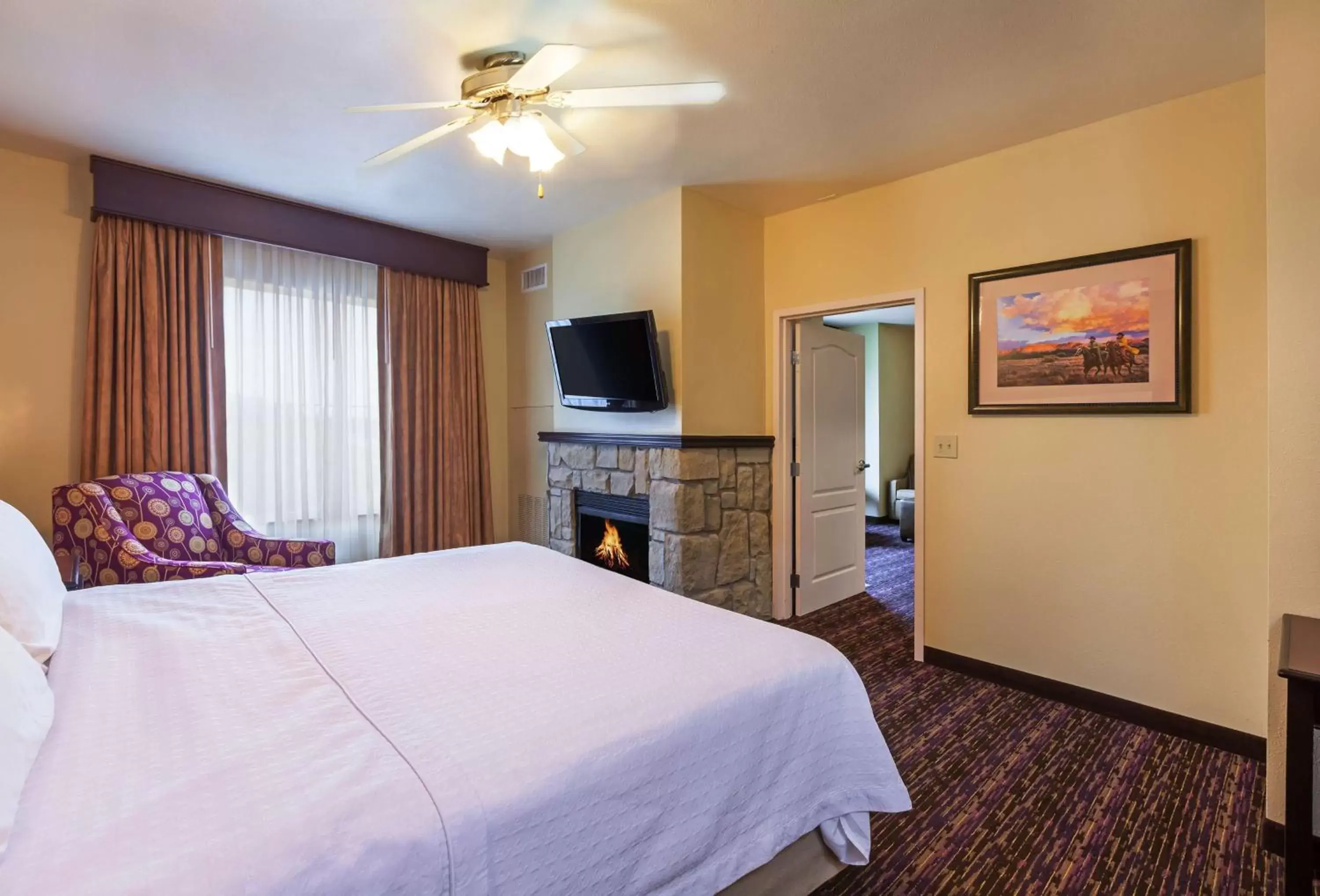 Bed, TV/Entertainment Center in Homewood Suites Wichita Falls