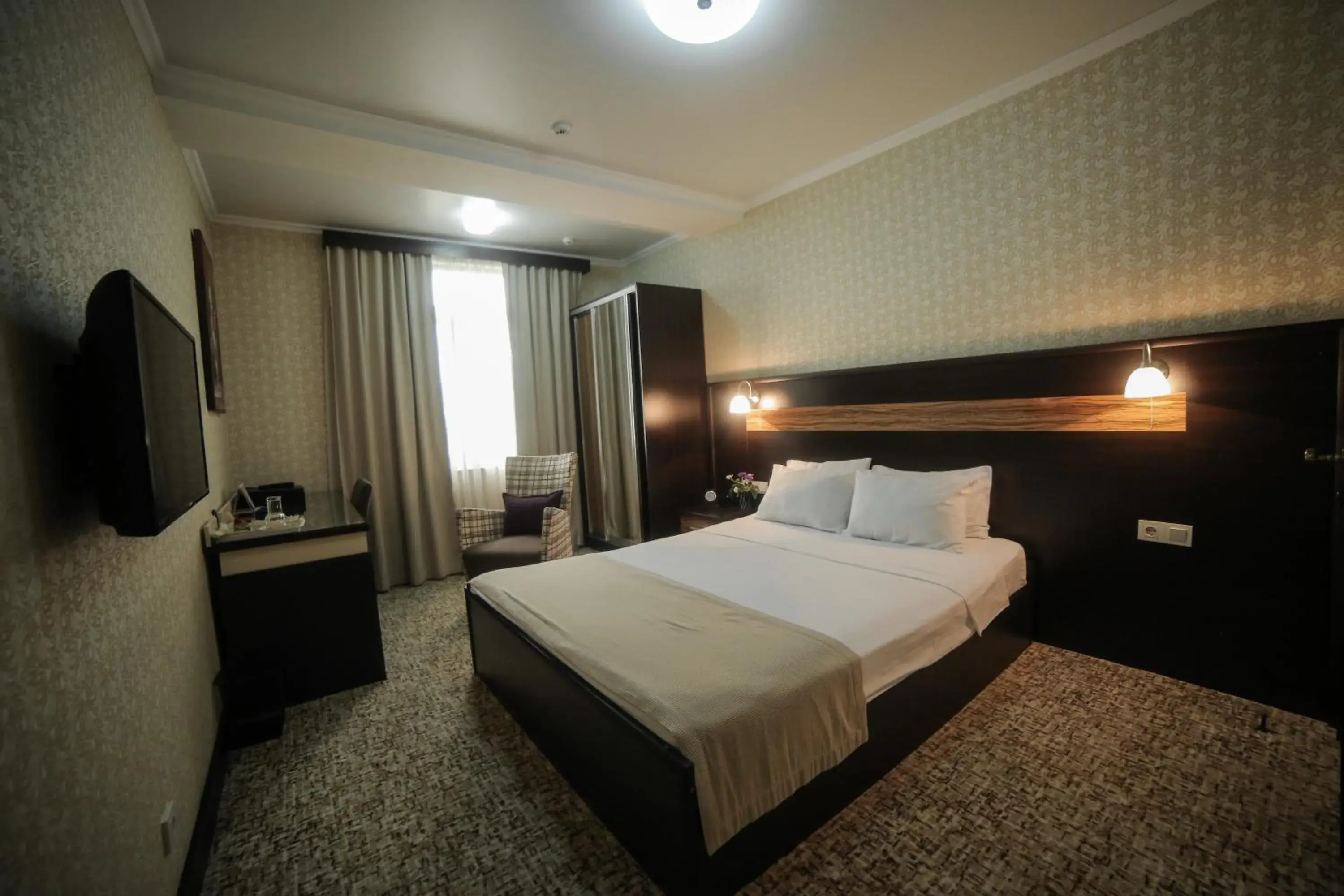 Bed in Onyx Hotel Bishkek