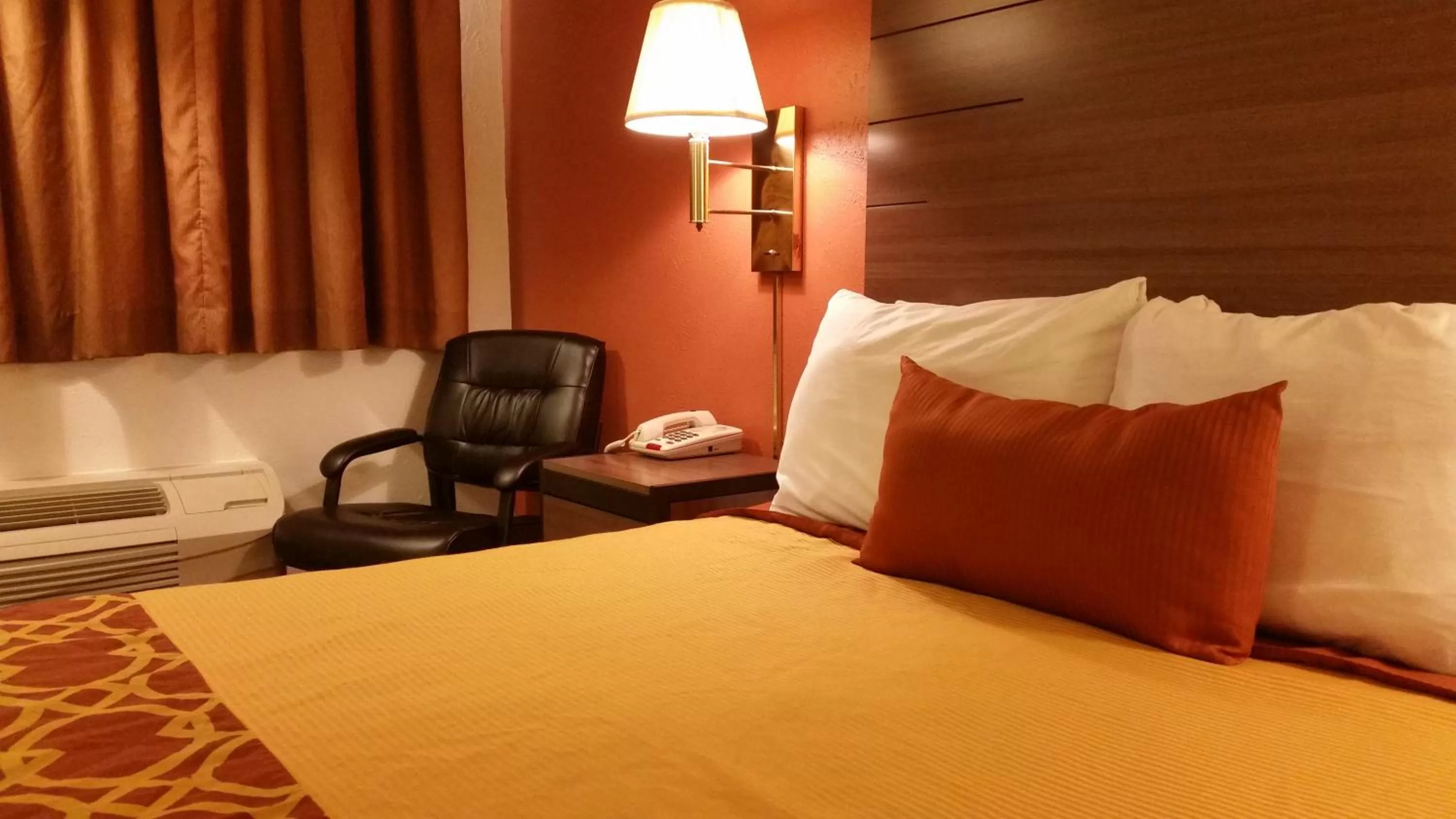 Bed in American Inn Of Liberal