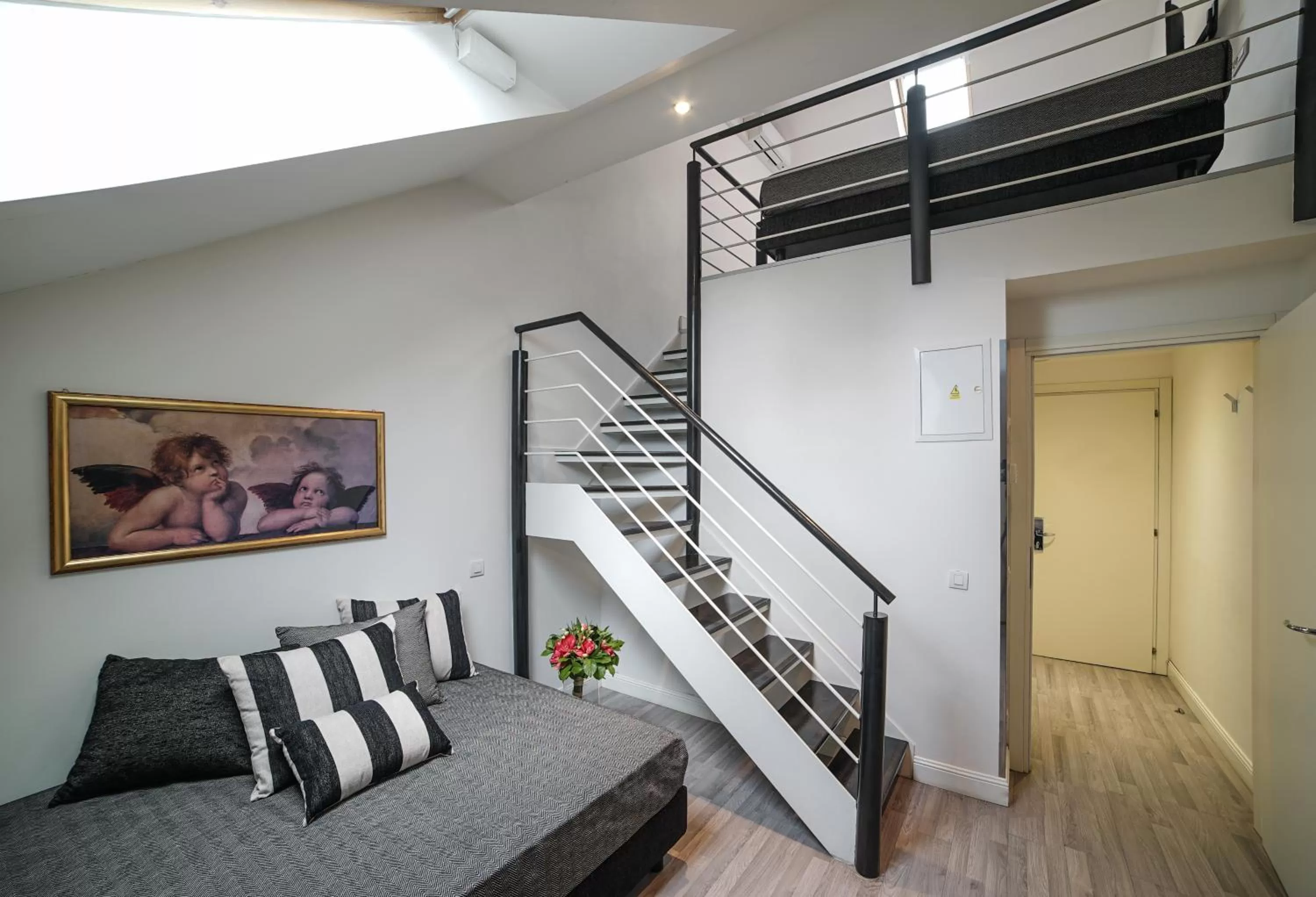 Living room, Bed in Hotel Assenzio Prague