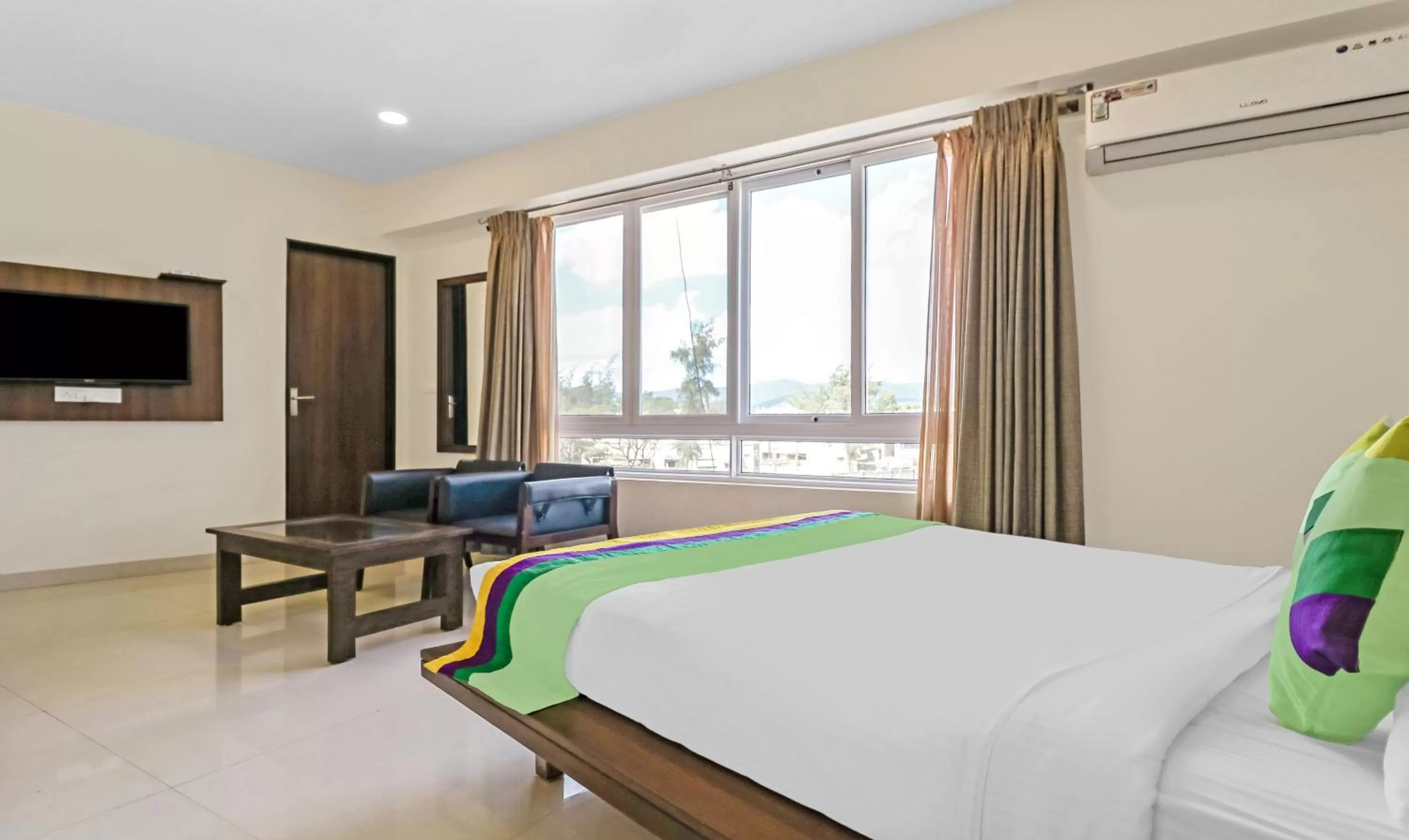 Treebo Trend Punarnava Bypass Road