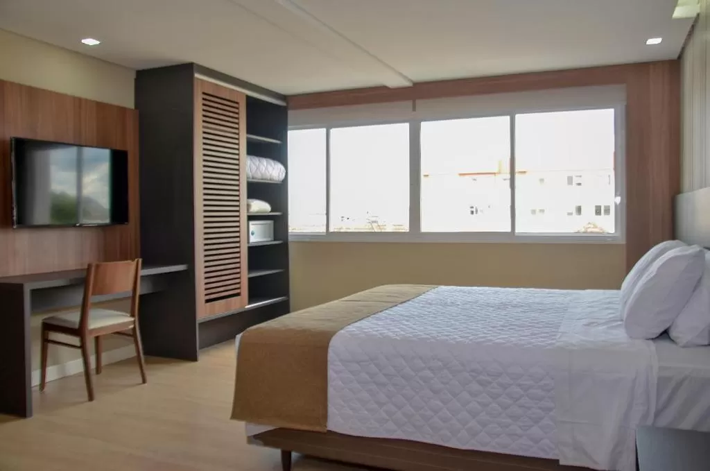 Bed in M Tower Hotel