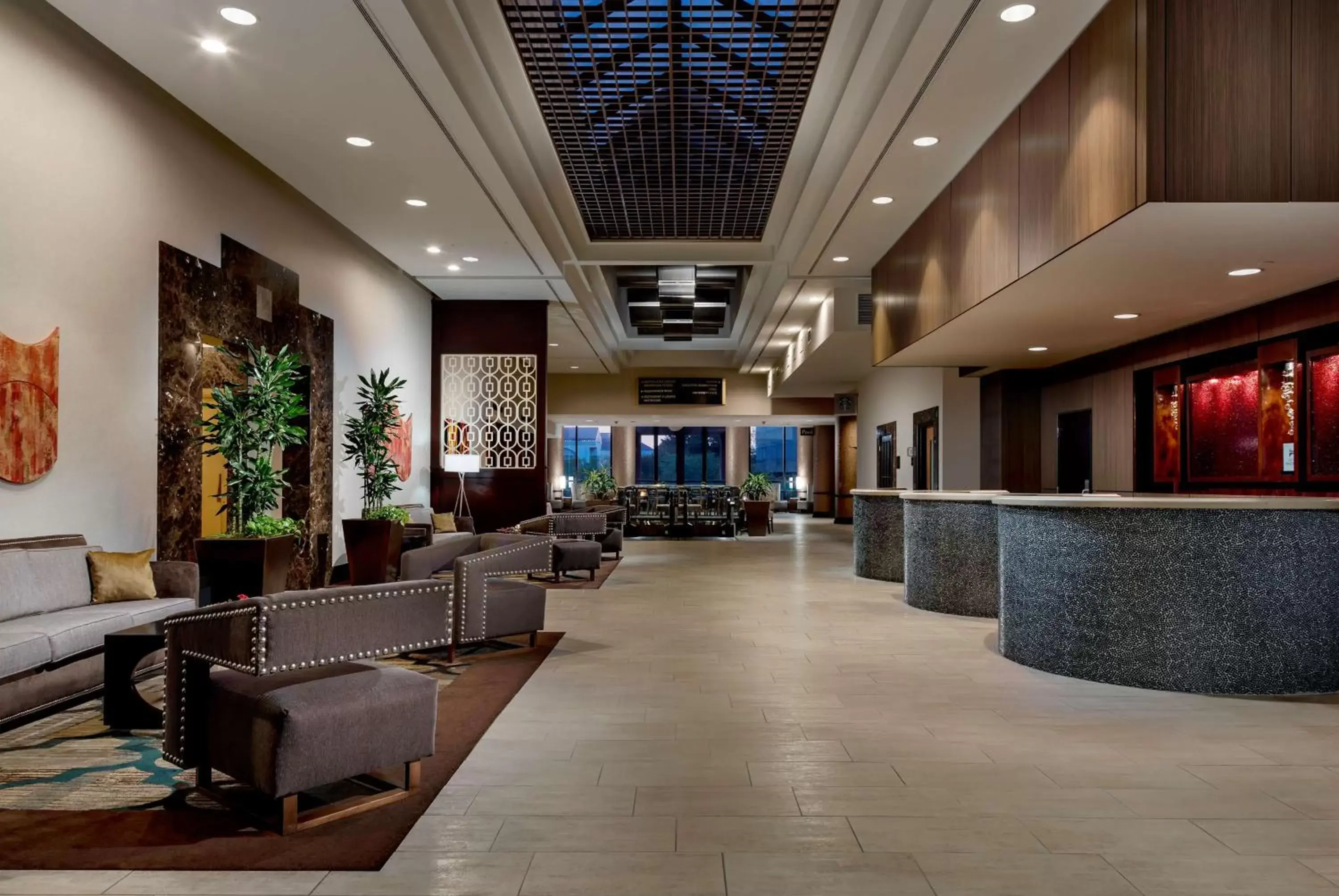 Lobby or reception in Hilton Charlotte University Place Lobby or reception in Hilton Charlotte University Place