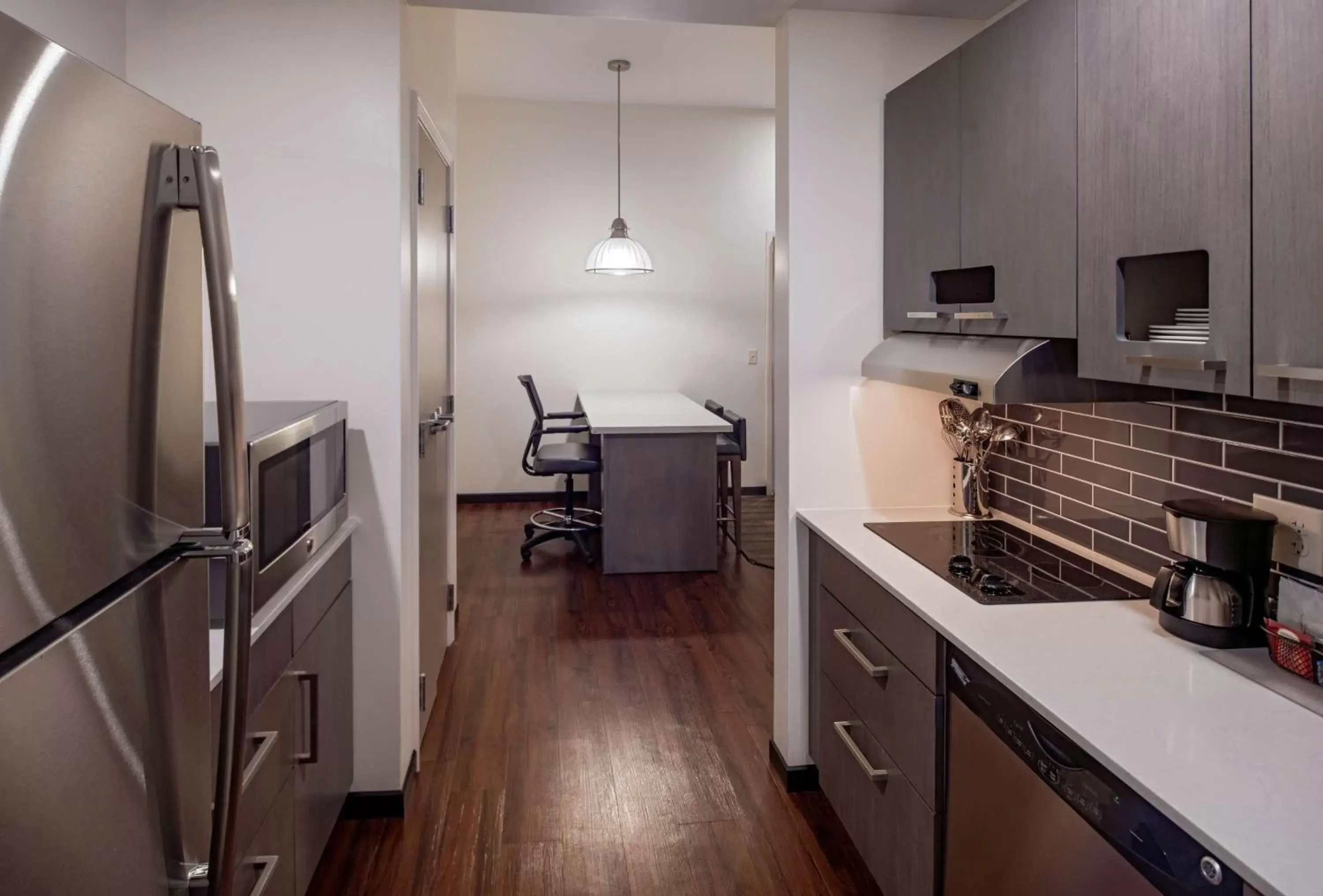 Photo of the whole room, Kitchen/Kitchenette in Hyatt House New Orleans Downtown