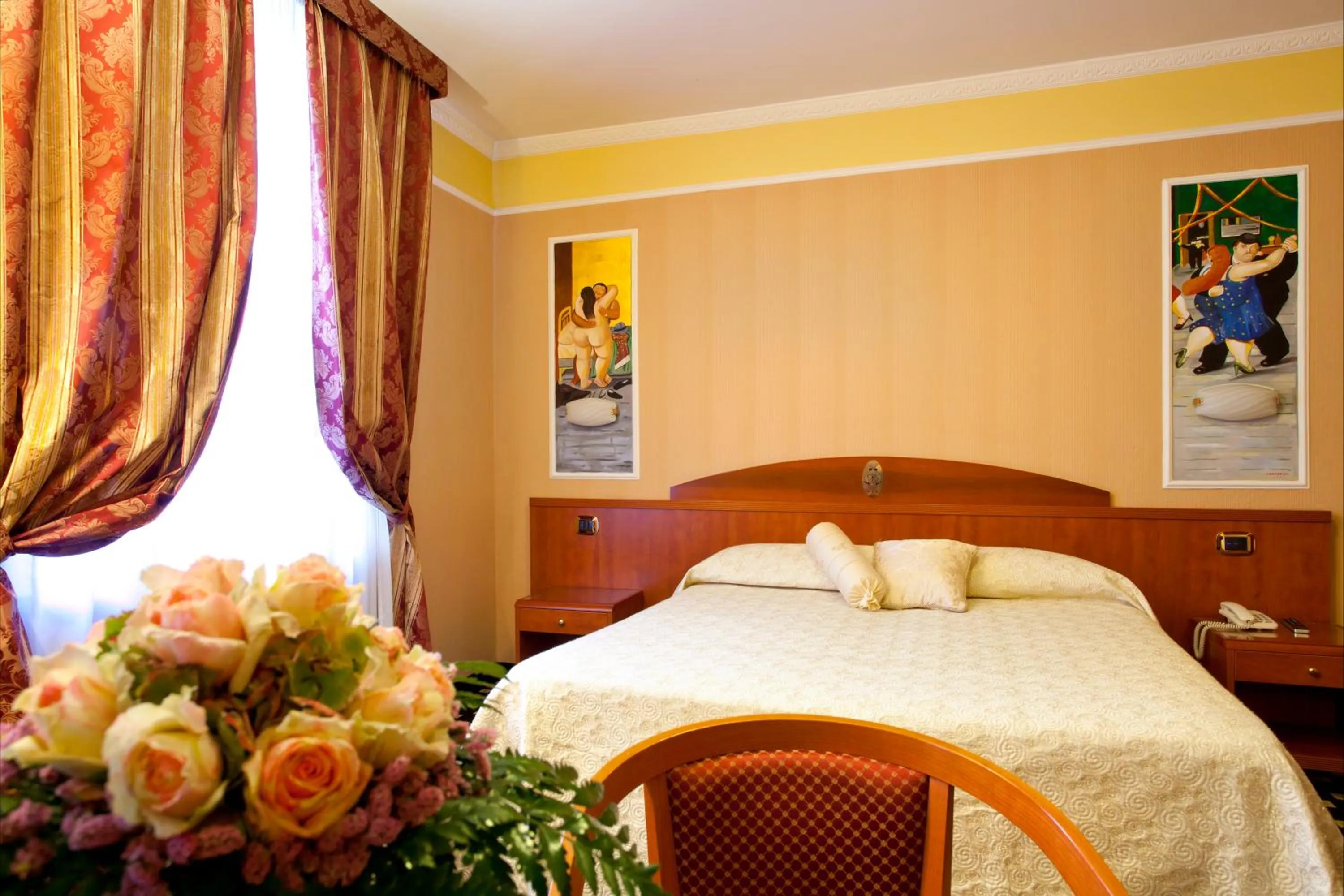 Bed in Boutique Hotel Puccini